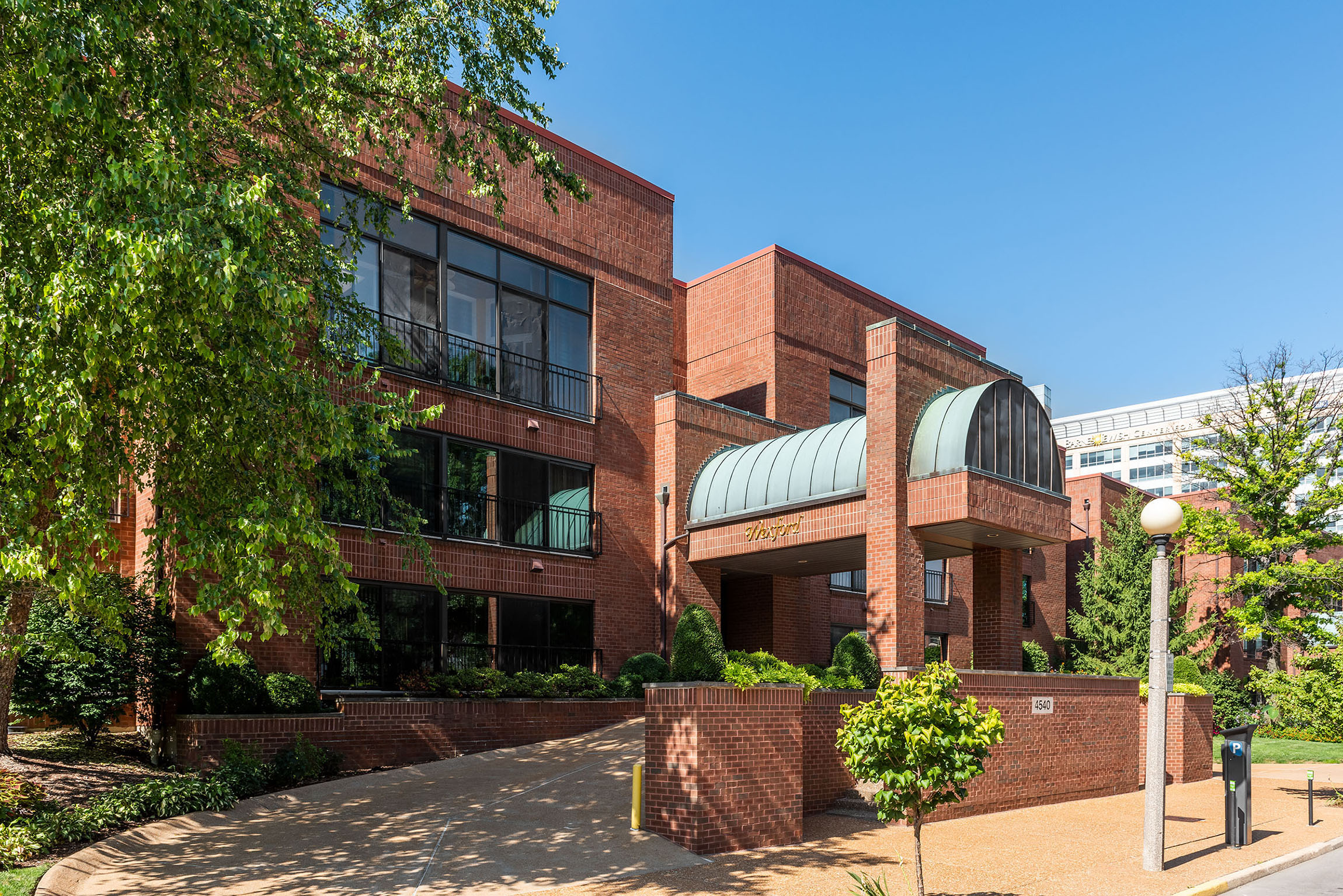 South facing  unit with outdoor patio for summer, enclosed sunroom for winter