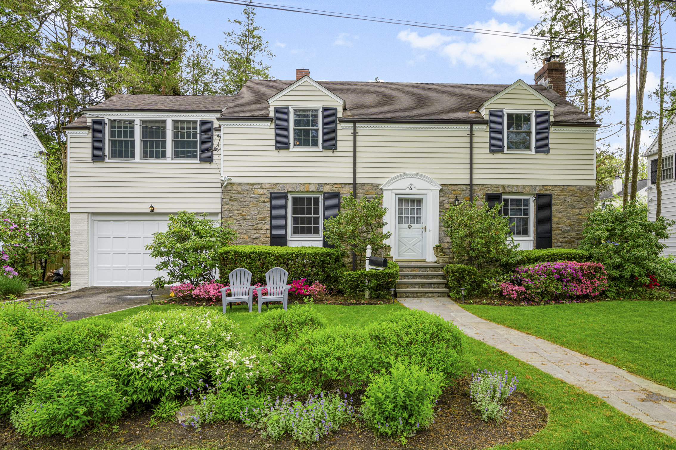 Welcome to this enchanting Colonial situated on a serene dead-end street