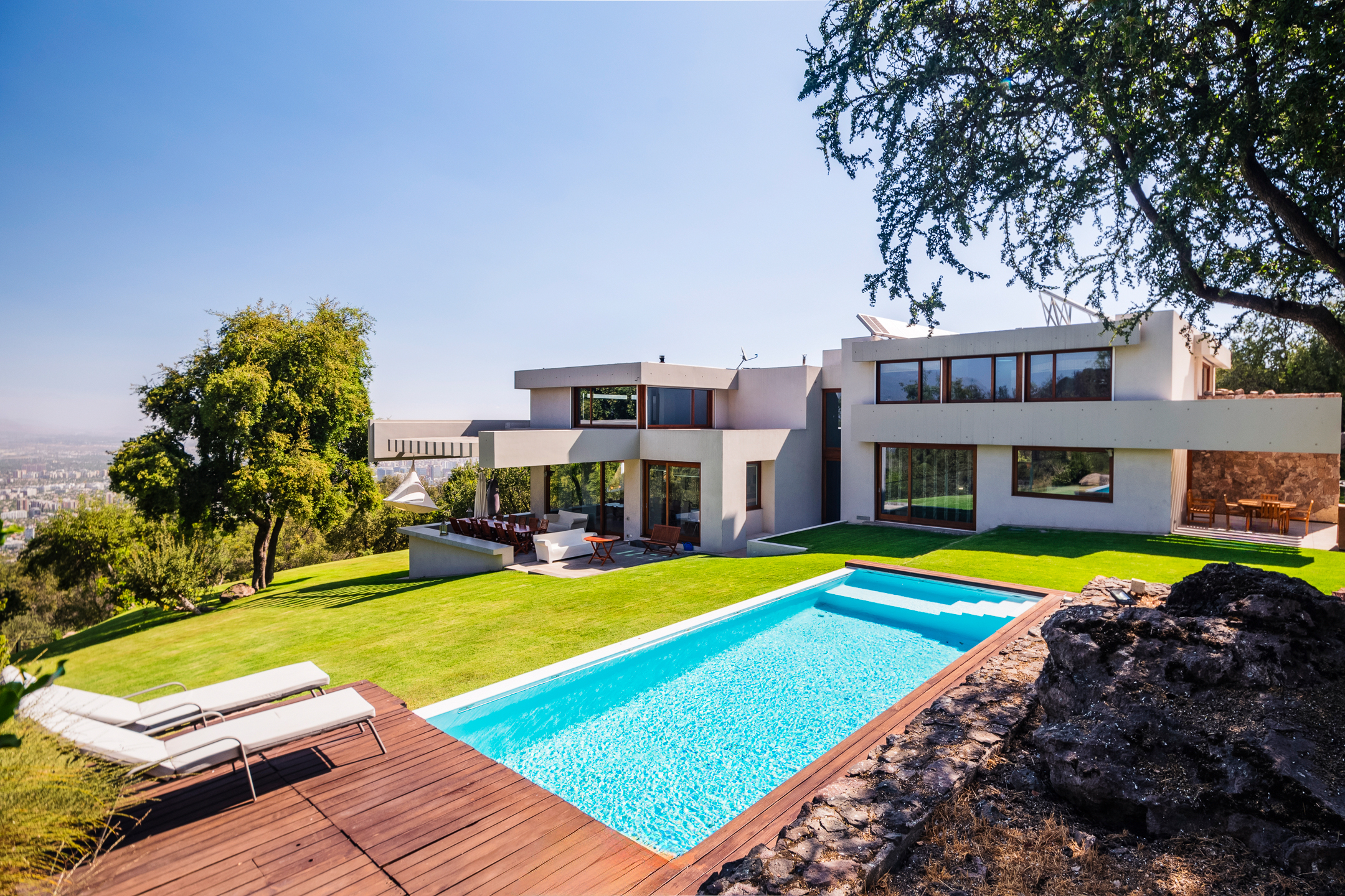 Modern house with unbeatable views of Santiago and the Andes mountain range.