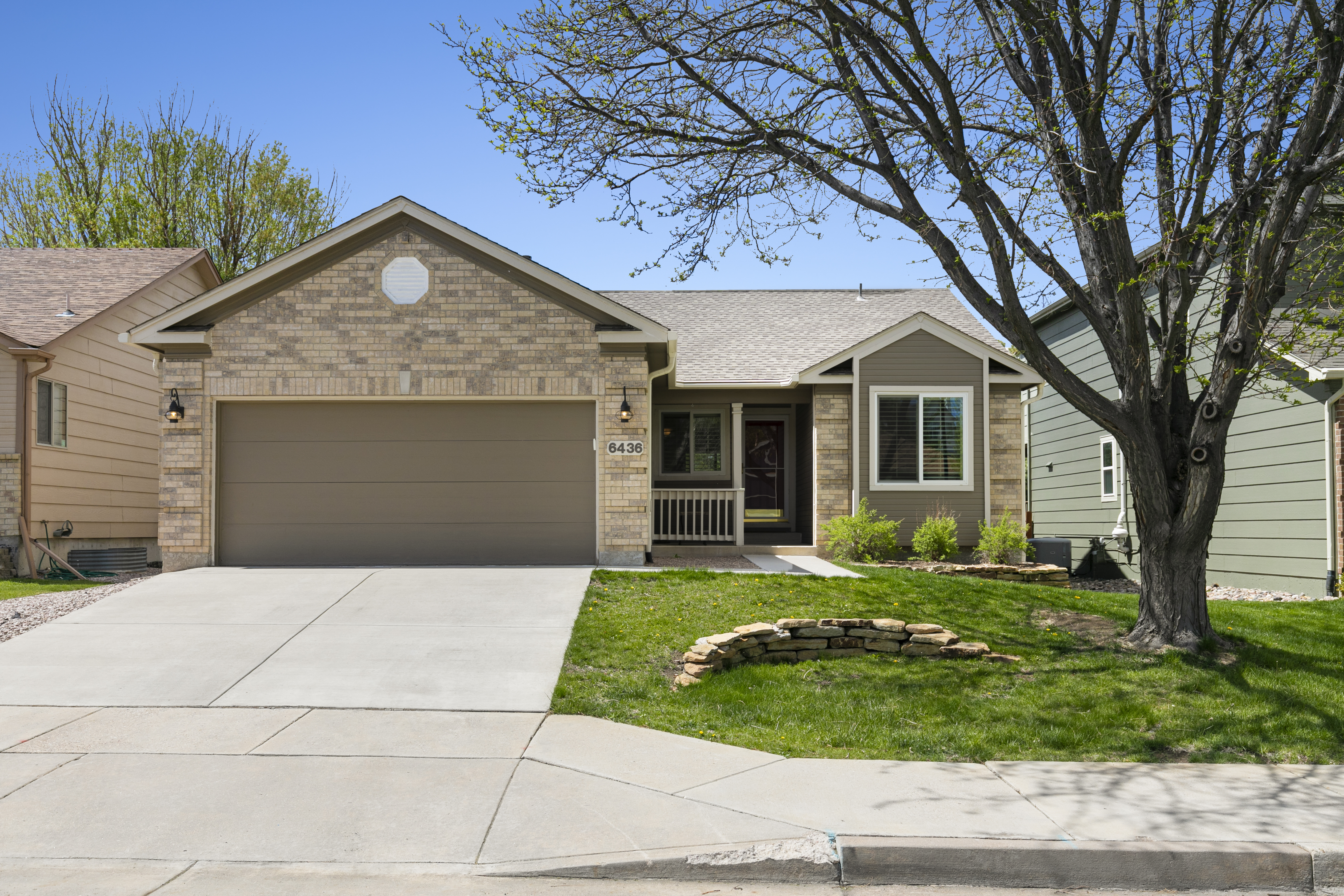 Welcome home to this charming, well-maintained Rancher near Cottonwood Creek Par