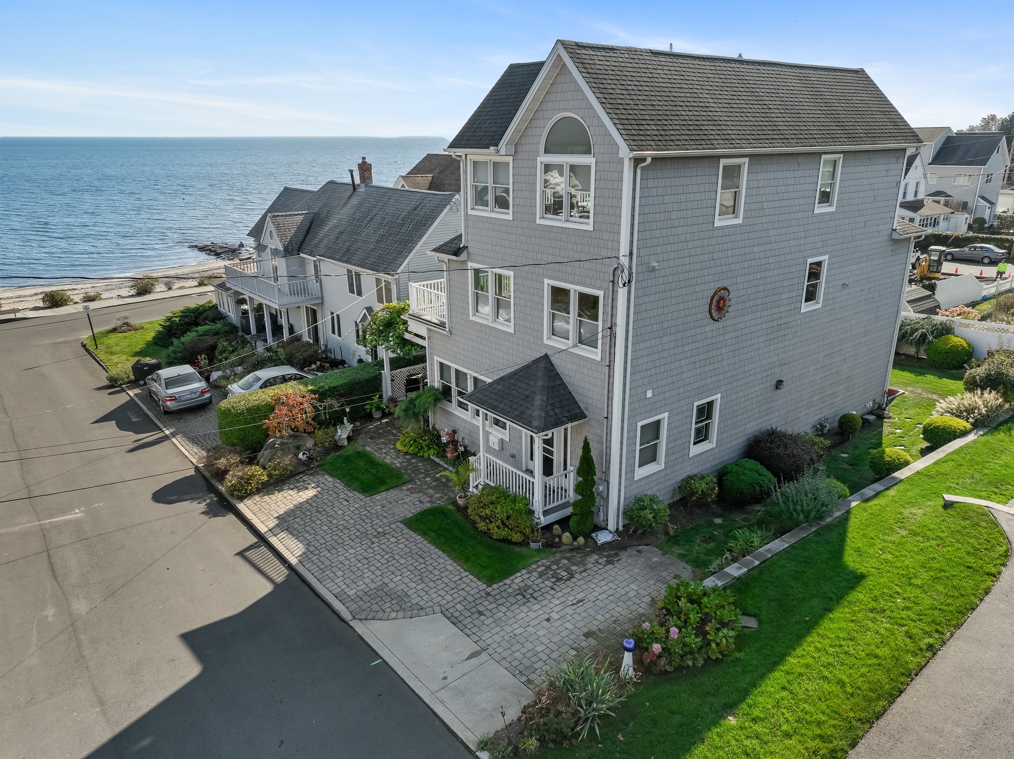 Luxury Beachfront Living in Woodmont with Stunning Views and Private Decks