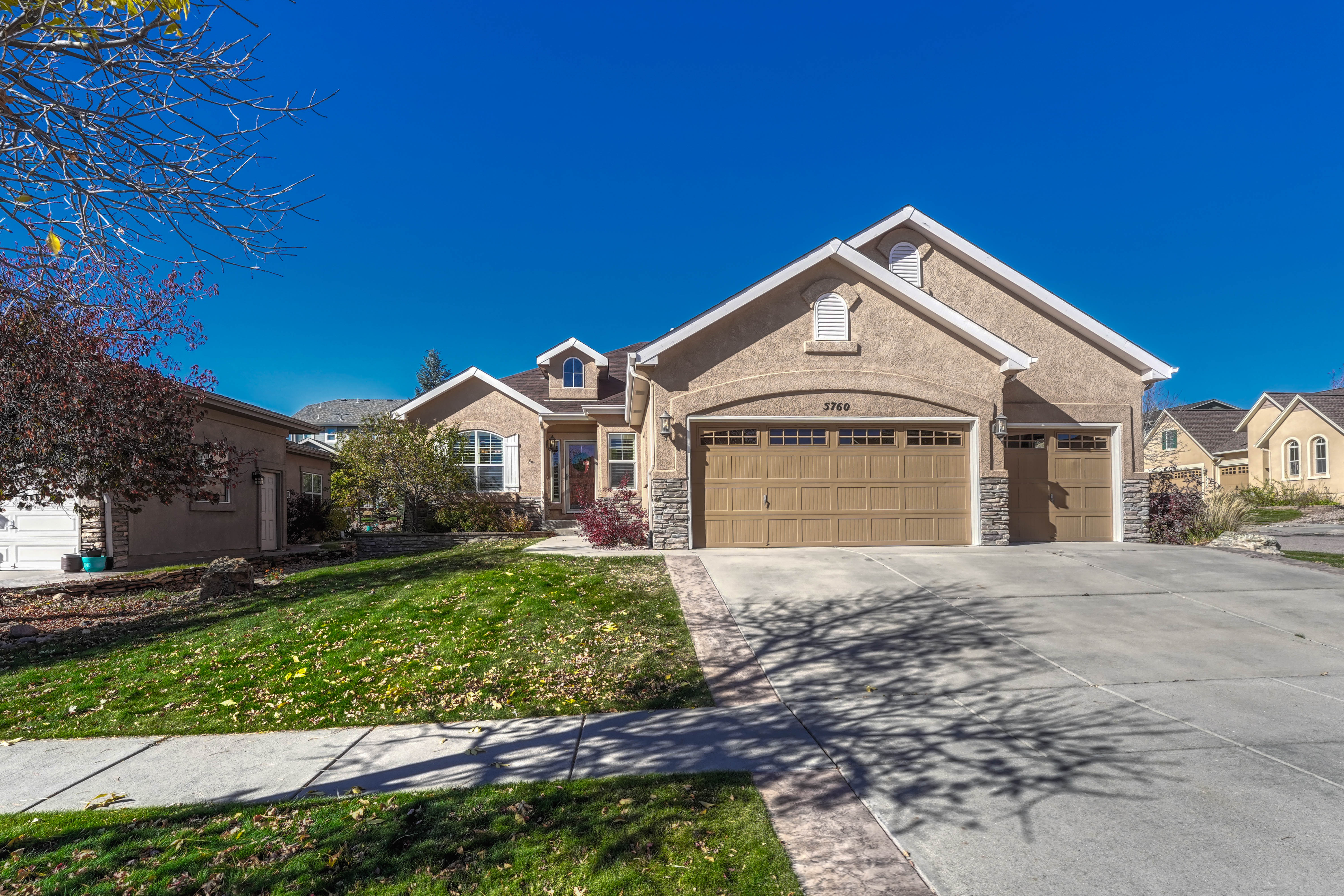 Corner Lot Charm: A Stunning Custom Ranch Home Awaits