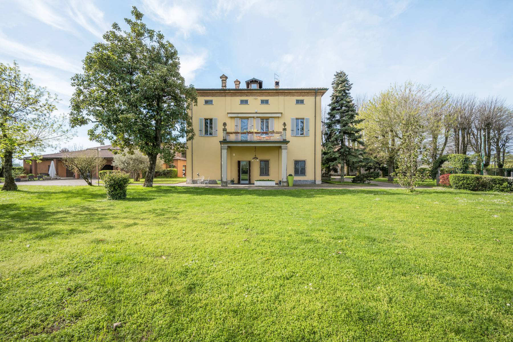 Exclusive 19th-century villa with garden and pool.