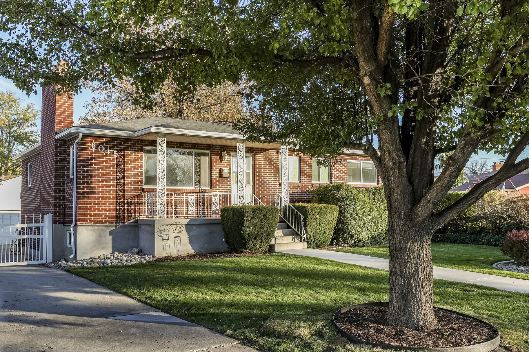 Solid Brick Rambler. Oversized 3 Car Garage.