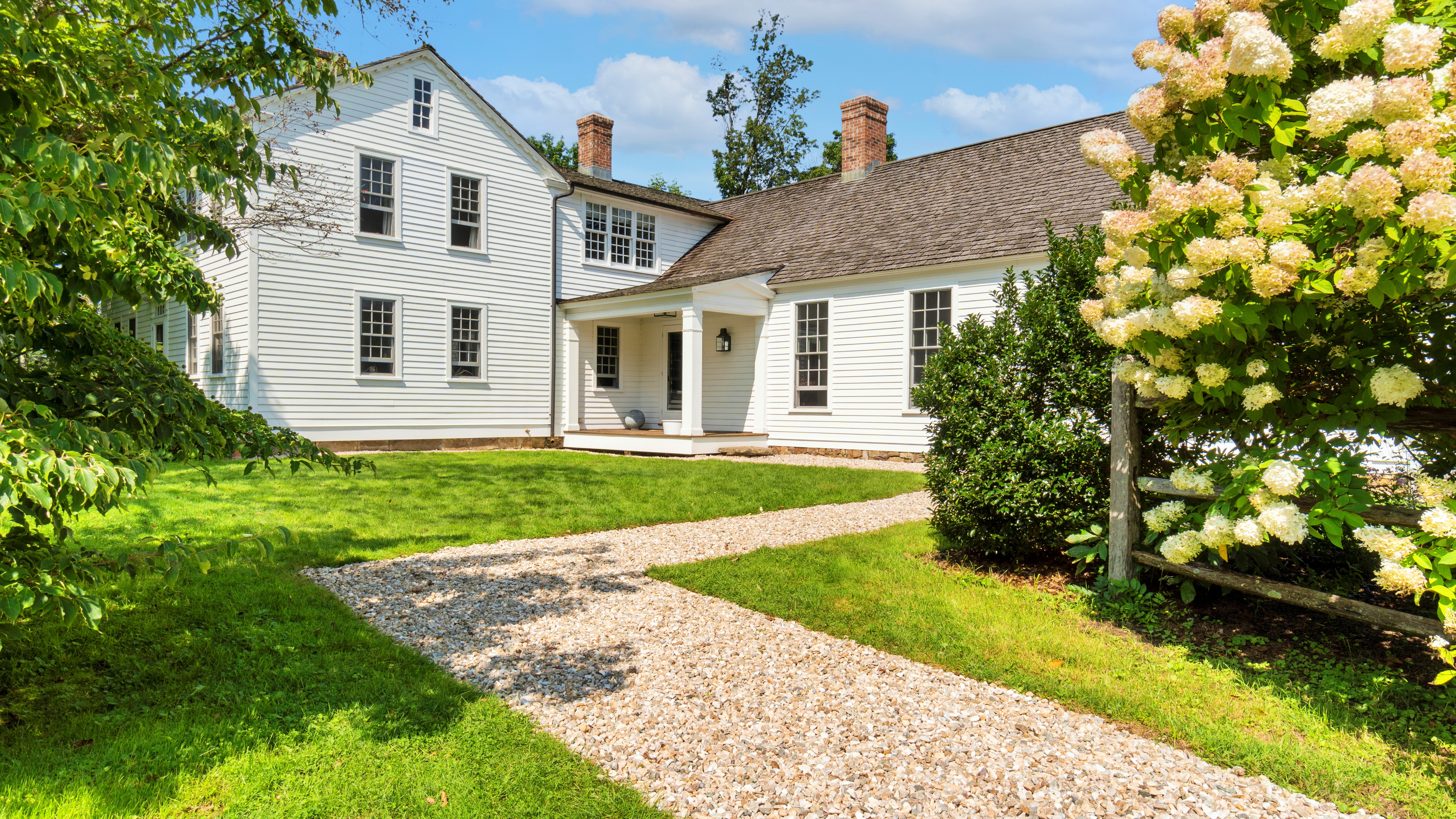 CLASSIC NEW ENGLAND FARMHOUSE FILLED WITH LIGHT AND IMMENSE CHARM