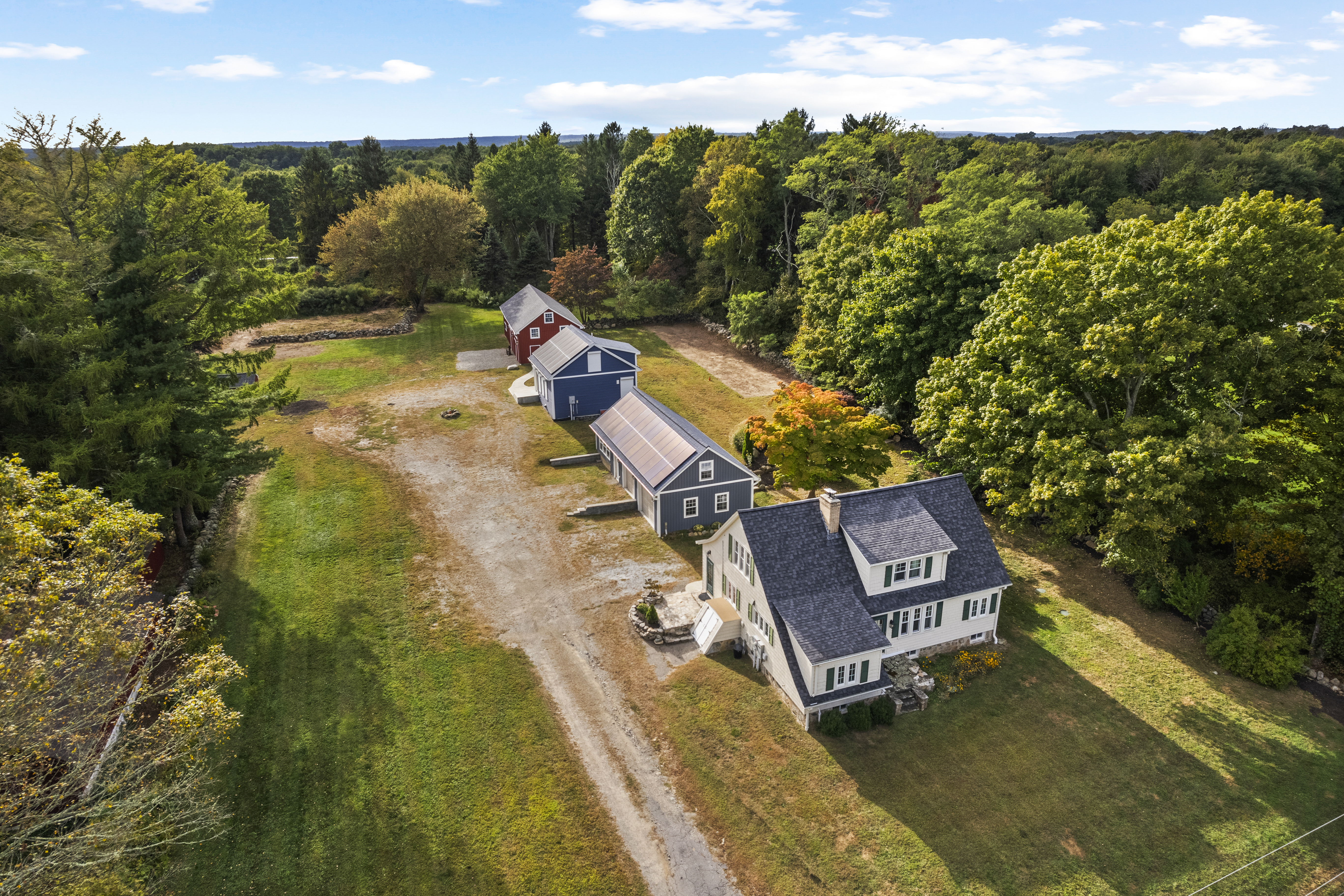 The perfect mix of New England charm & utility in this renovated Farmhouse