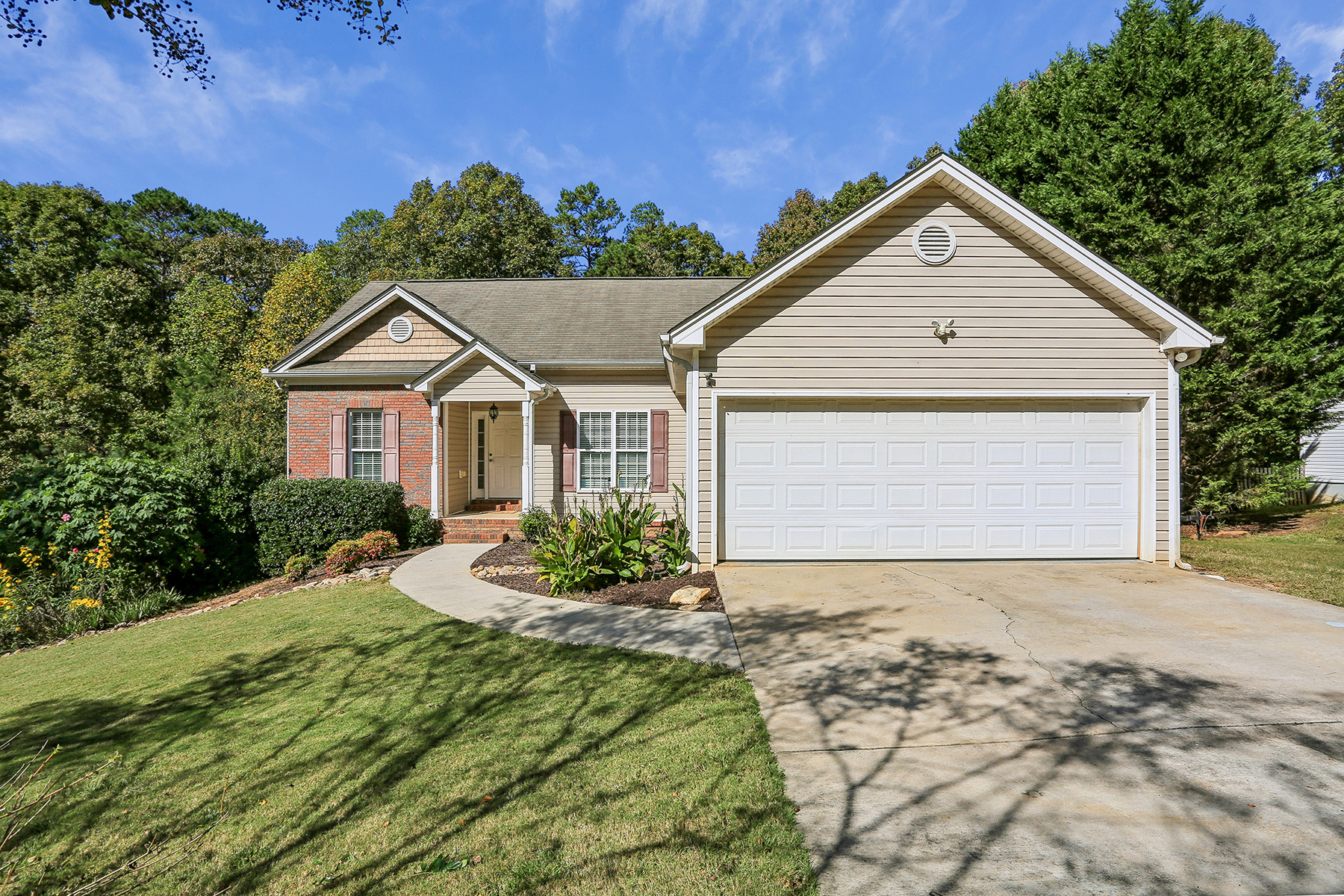 Lake Lanier Home Situated on 0.7+/- Acres in the Lakeshore Forest Neighborhood