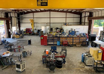 Overview of shop area with crane service