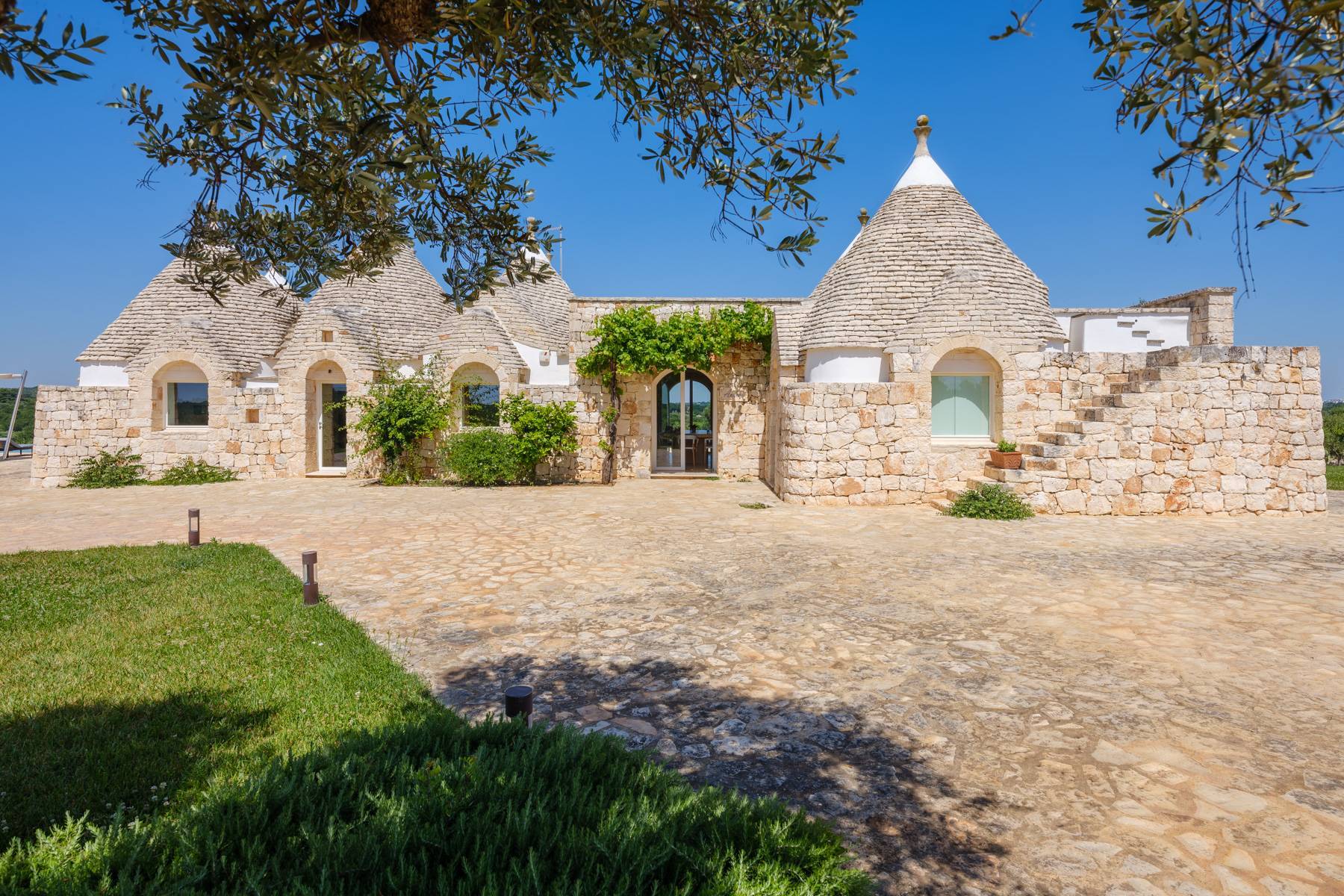 Exclusive trulli compound immersed in nature