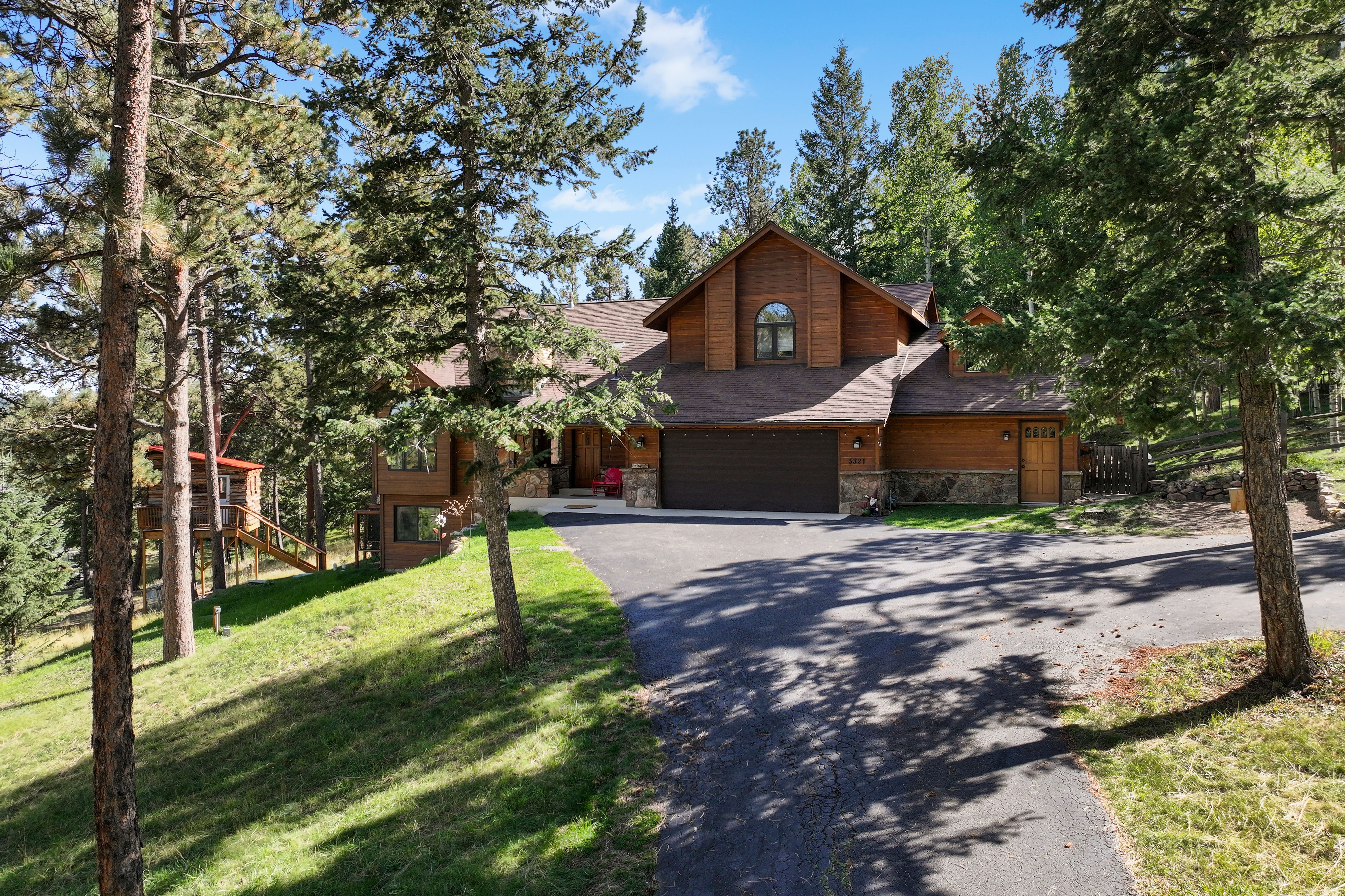 Rare property on nearly 1.4 acres surrounded by wildlife, trails, and nature