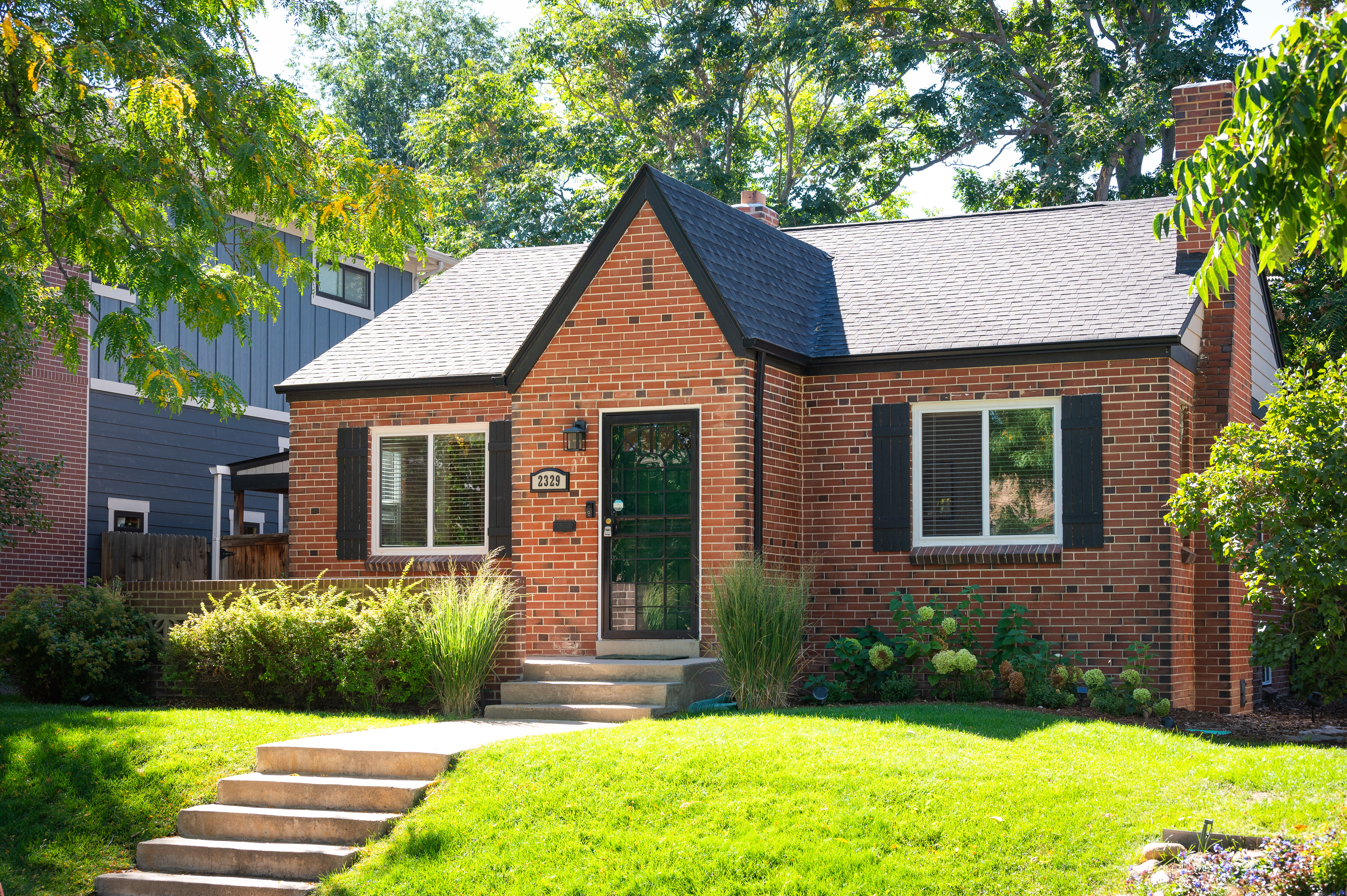 Charming Tudor-Style Home Located on Beautiful Tree-Lined Street