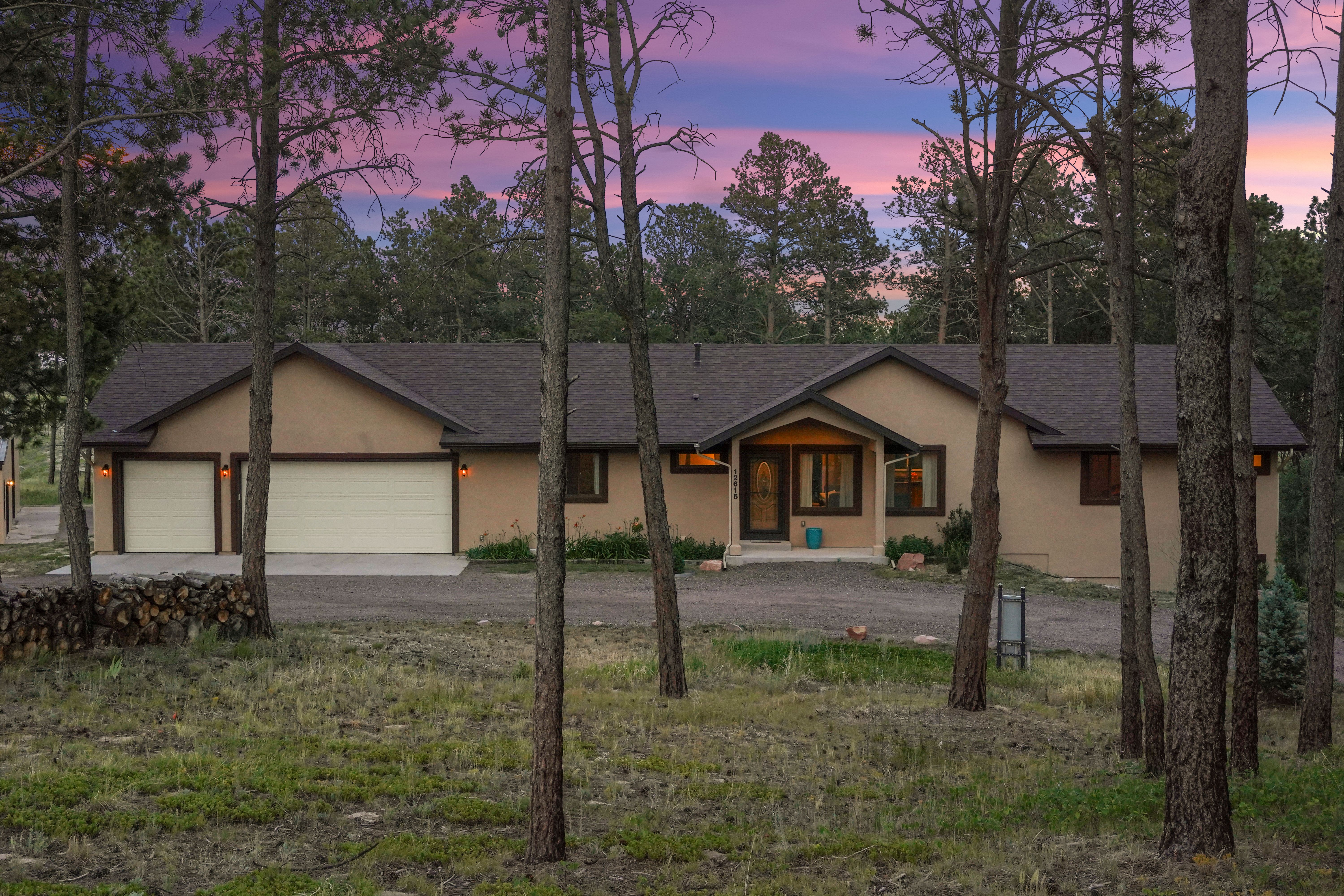 Custom rancher w/ over 3,600 sq ft and 4,400 sq ft RV garage on 5 acres