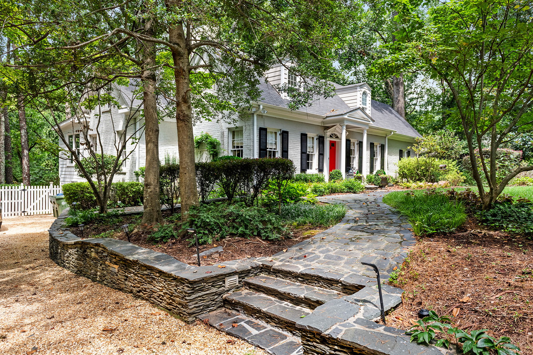 Beautiful Cottage Nestled on a 1.5+/- Acre Private Lot in Buckhead
