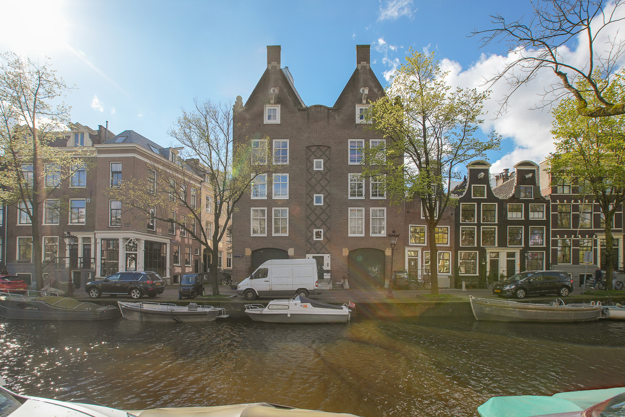 Very charming sunny canal apartment with rooftop terrace, elevator, and parking