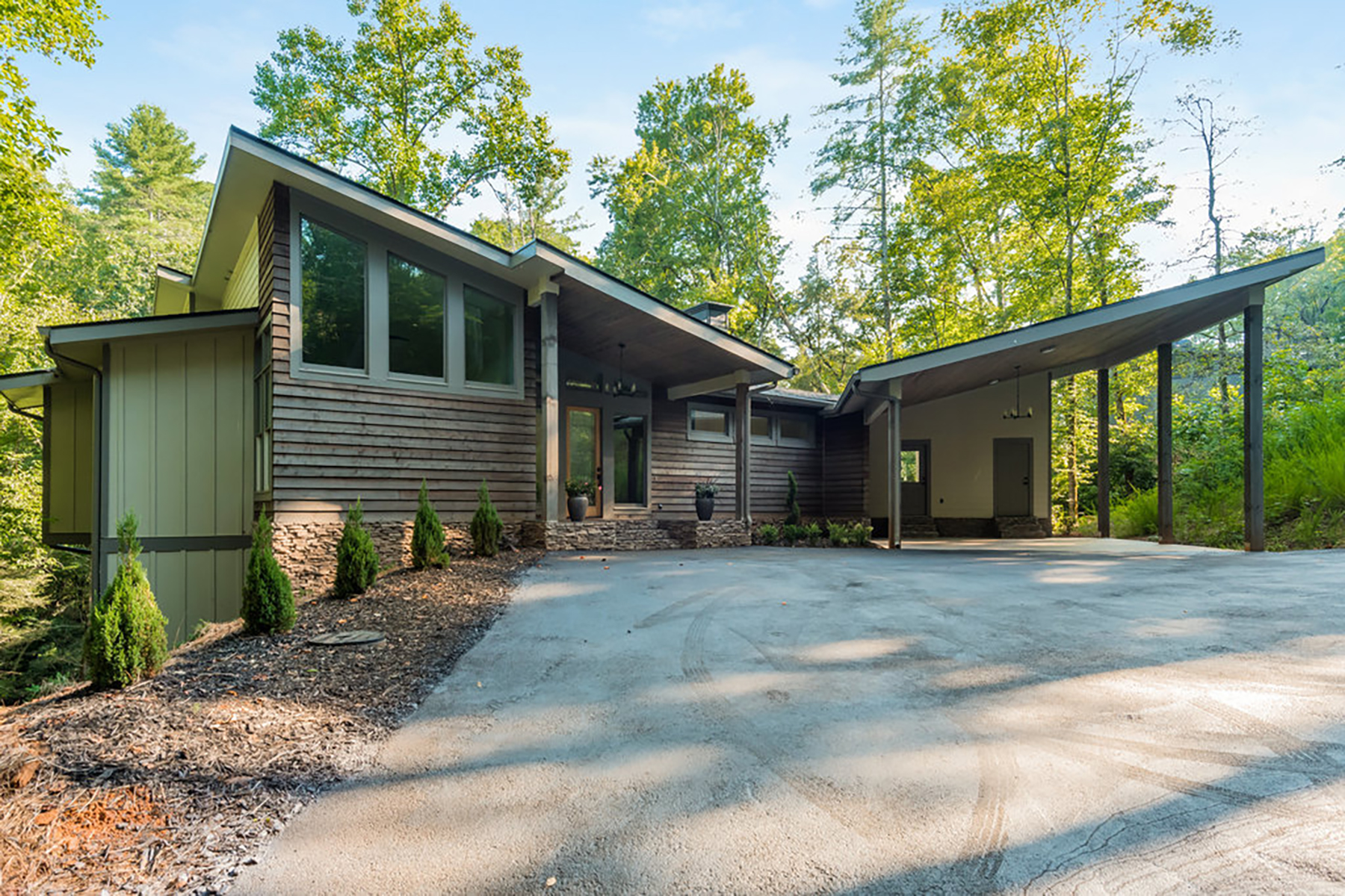 An Architectural Masterpiece Nestled on a Pristine Trophy Trout Stream