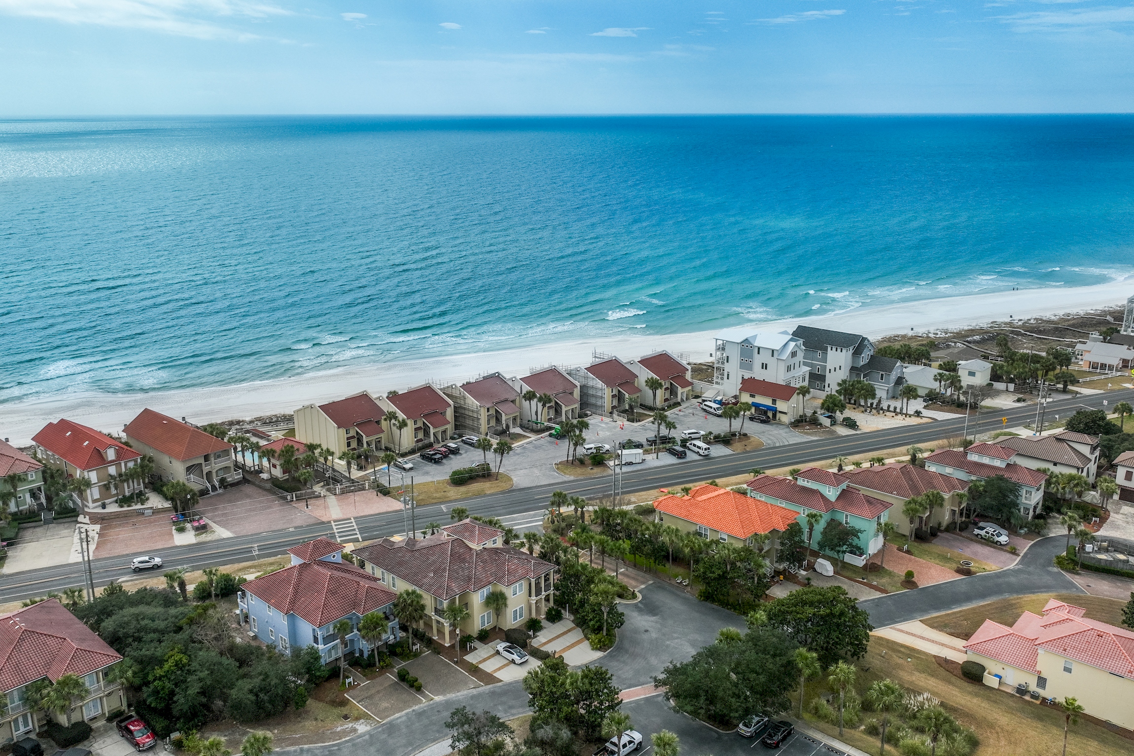 Coastal Multi-Level Retreat With Water Views In Gated Beach Community