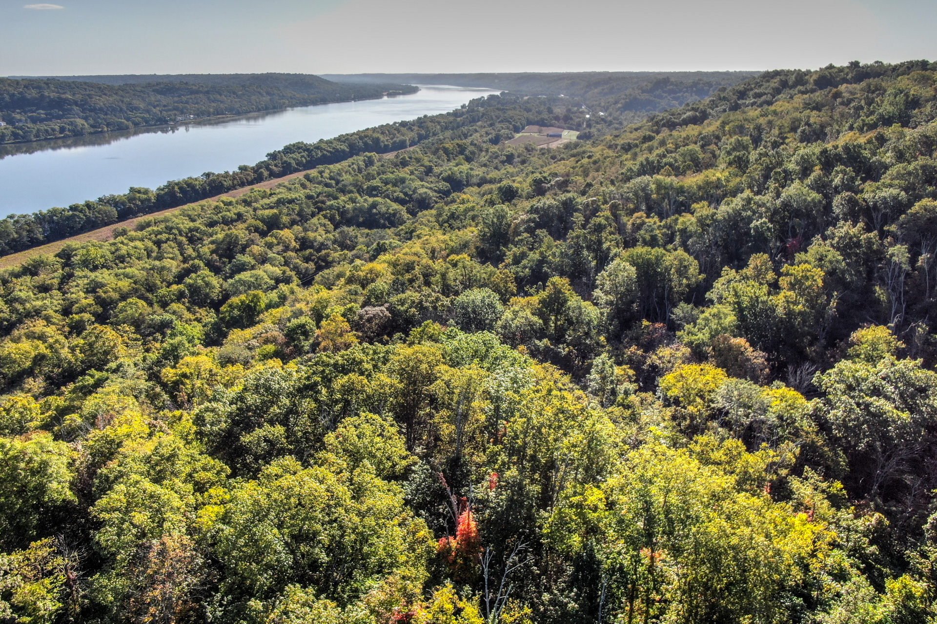 Sweeping River Views Atop Natural Wooded Escape