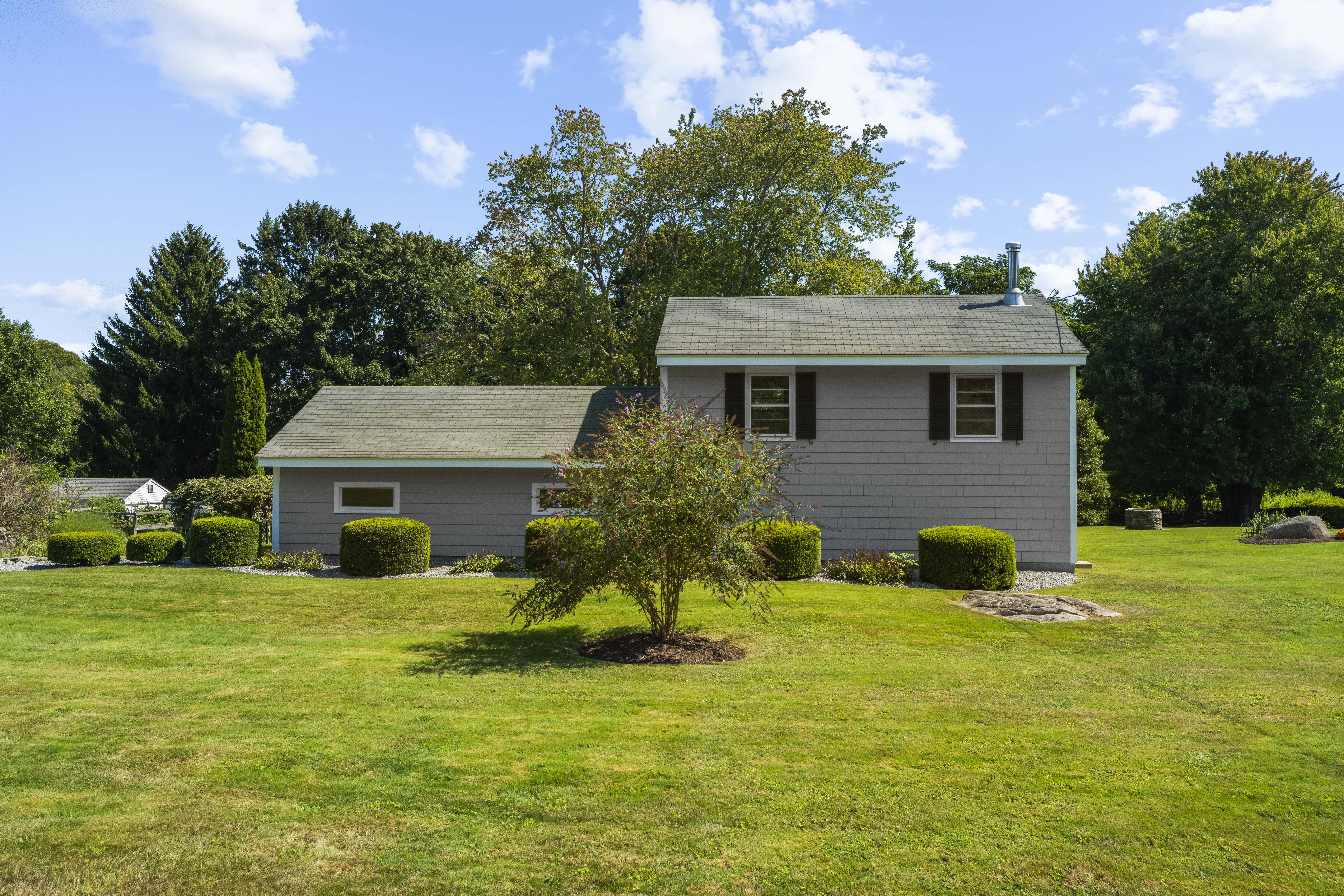 Stately Garage-Barn nestled on .53 Acres on private road just a few miles to His