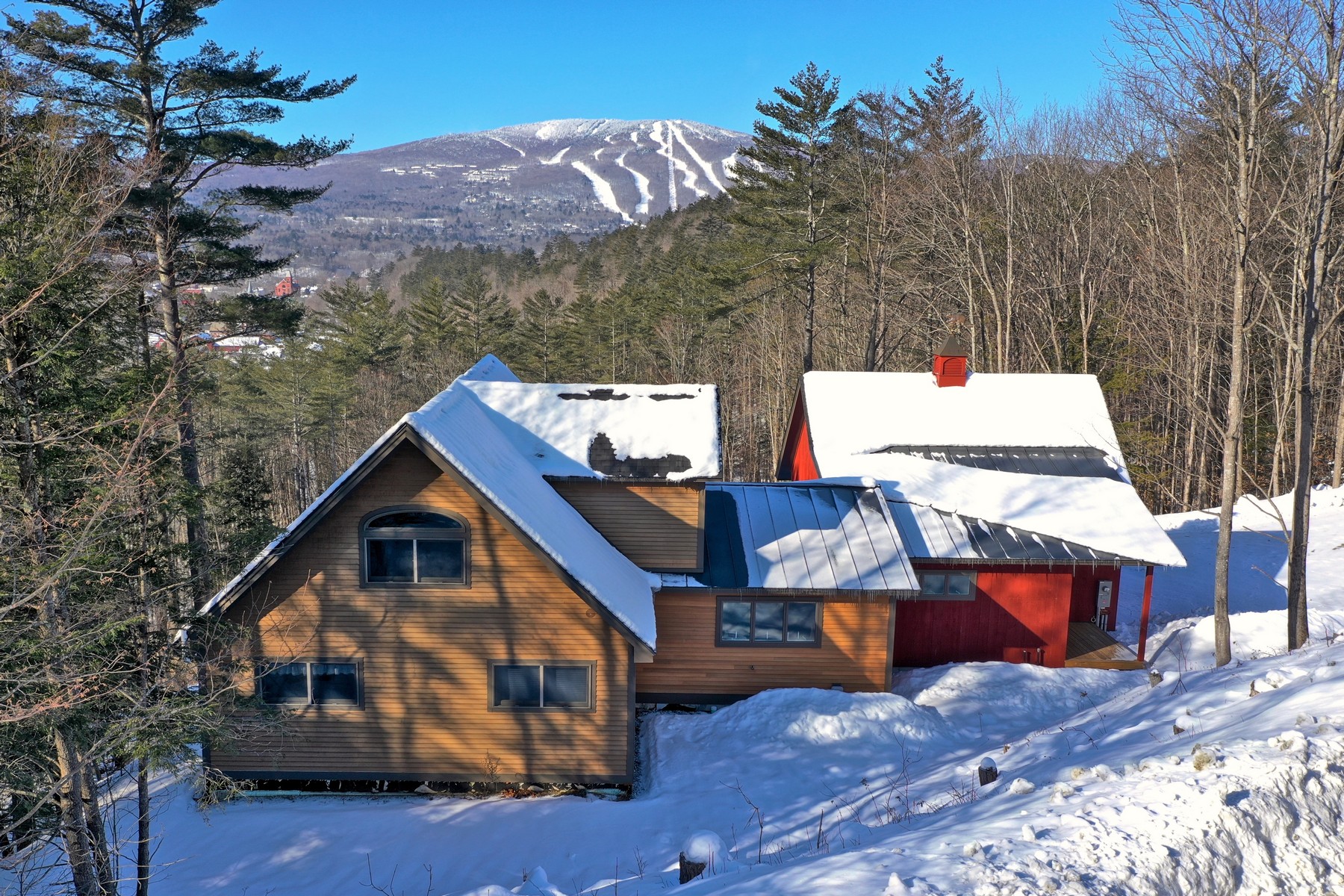 Tucked away on a private road with views of Okemo