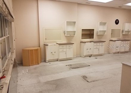 Unit #A is plumbed and wired for a 4 position beauty salon, this picture shows 3 of those positions with cabinets, mirrors and p
