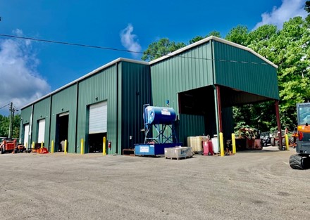 Rear of shop with covered power wash area