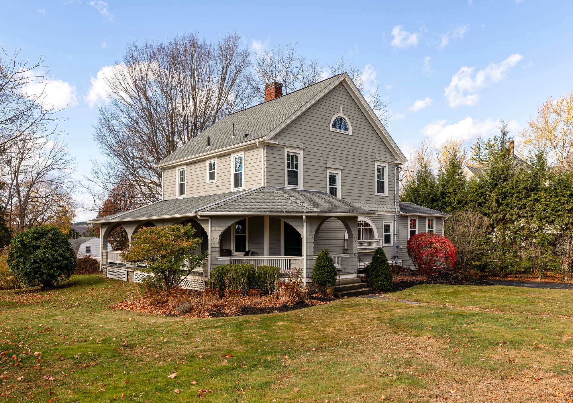 Currier & Ives colonial home iconic wraparound porch