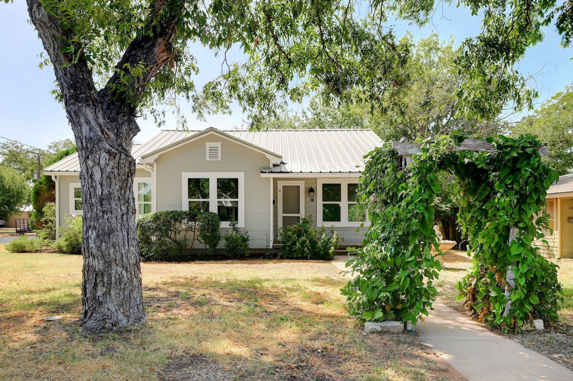 Tree Shaded Corner Lot within a Short Distance to Downtown