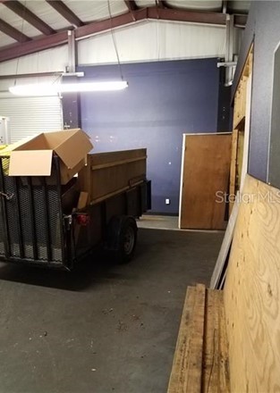 The right side of the warehouse/shop area.  The wall to the right is the wall for the office, work booth and a storage area.  Th