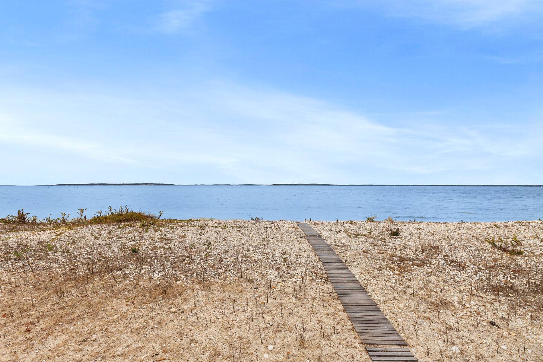 Waterfront: Beach on One Side, Cove with Dock on the Other