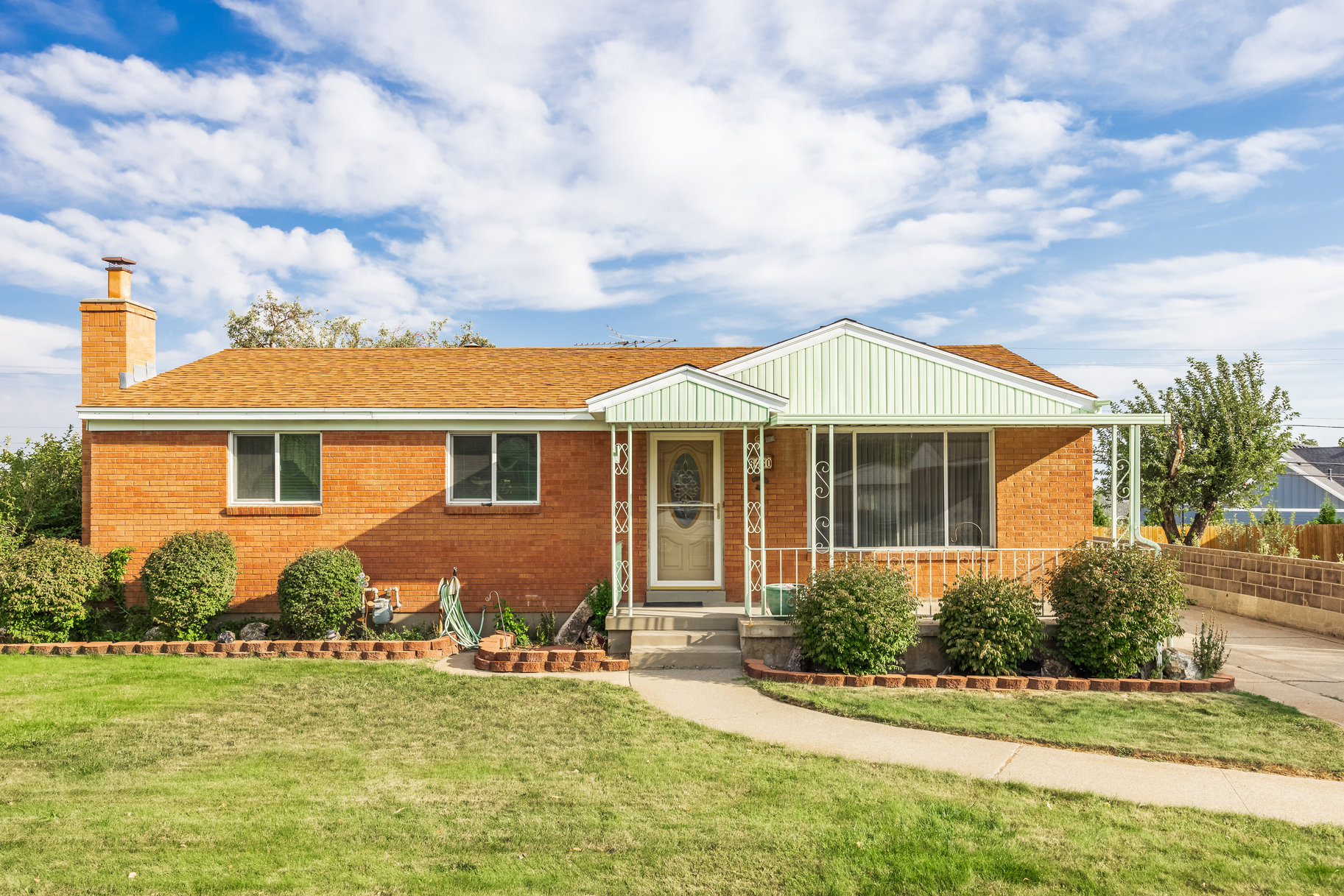 Charming Well-Preserved All-Brick Rambler, Cared for By The Original Owner