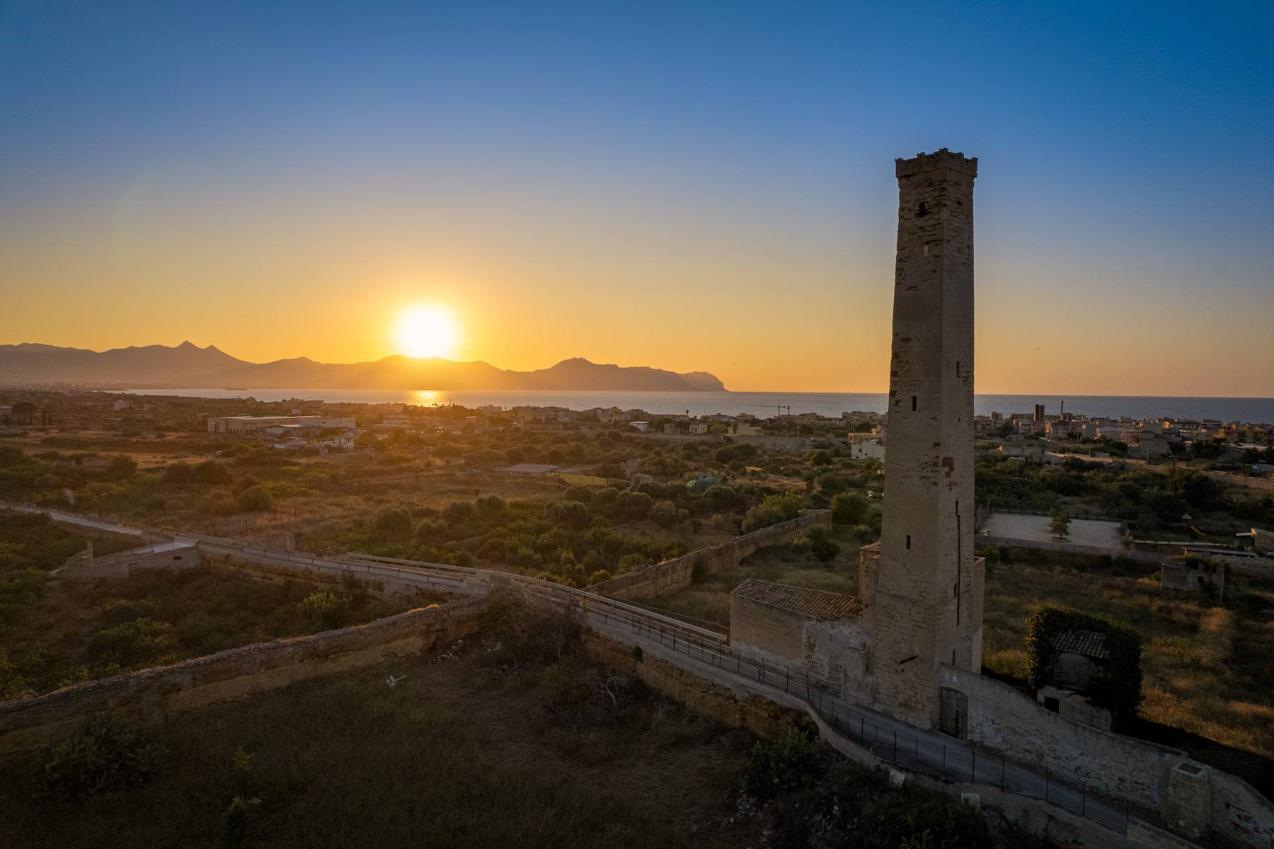 Ancient water tower near near the sea in Bagheria