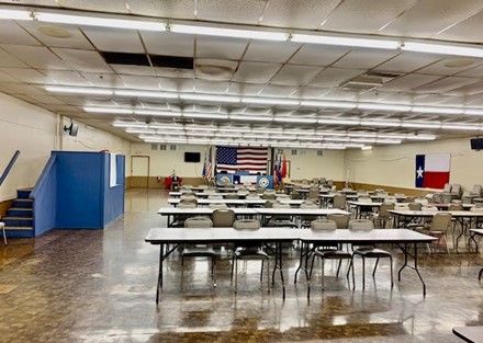 Large meeting room with elevated speaker platform