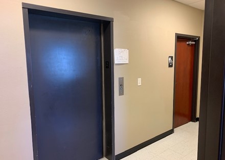 Second floor, elevator access, and one of two restrooms