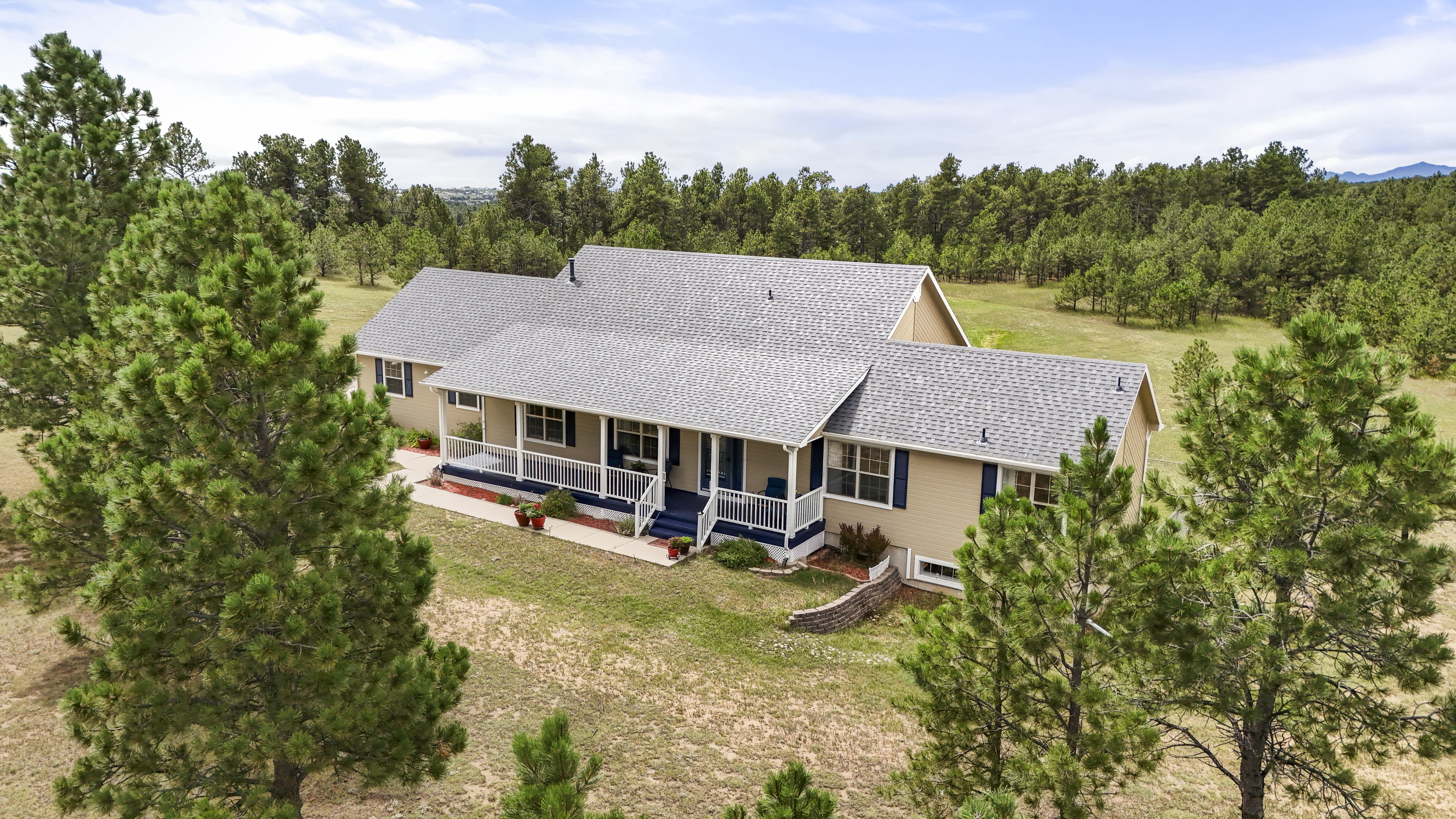 Stunning custom rancher perfectly situated on a picturesque 5 acre parcel