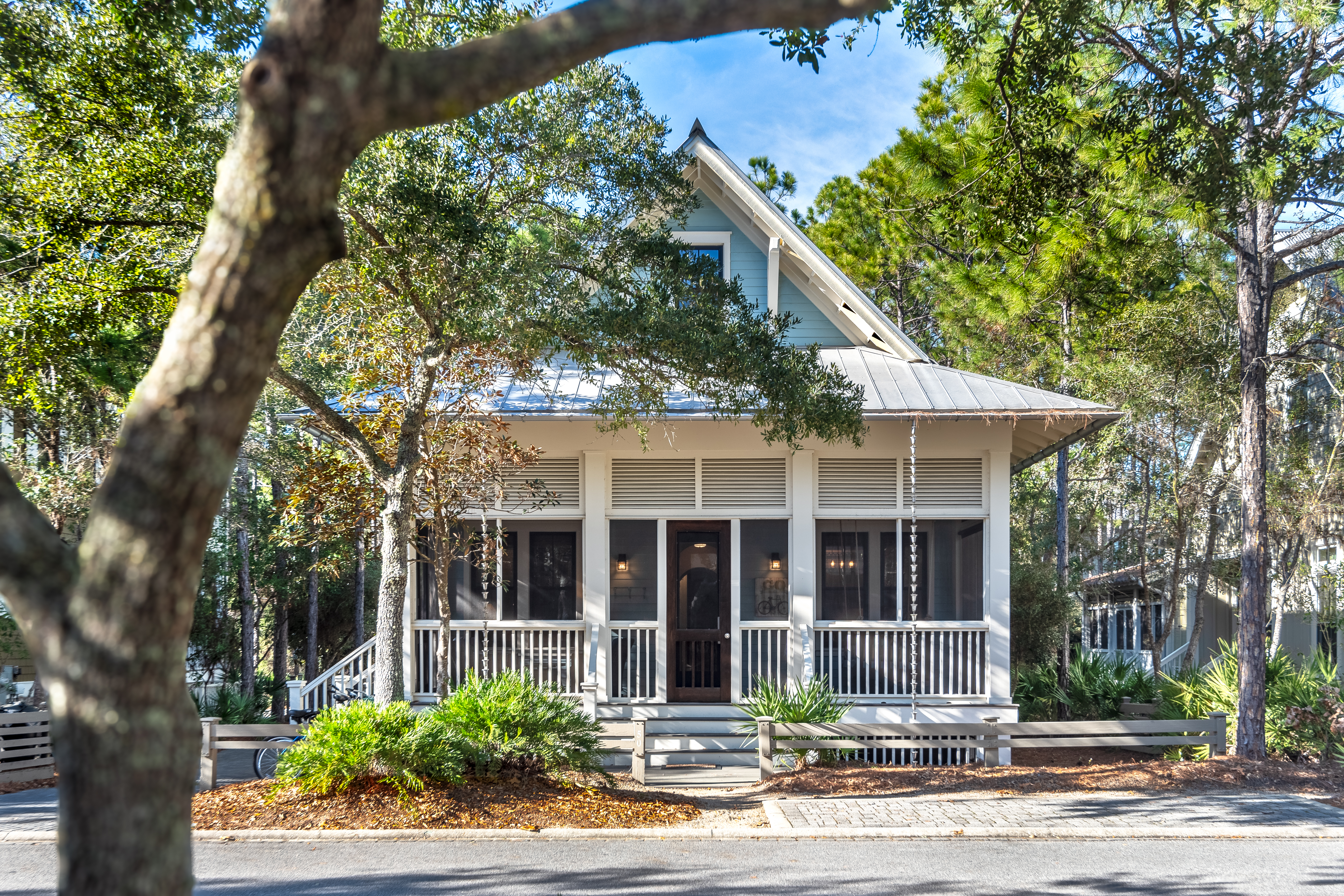 Updated Home With Multiple Porches Backing Onto Wooded Preserve