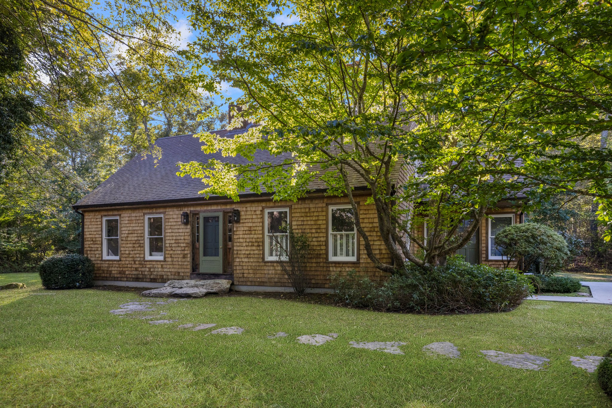 Comfort, Privacy, and Timeless Charm on an Acre of Lush Grounds