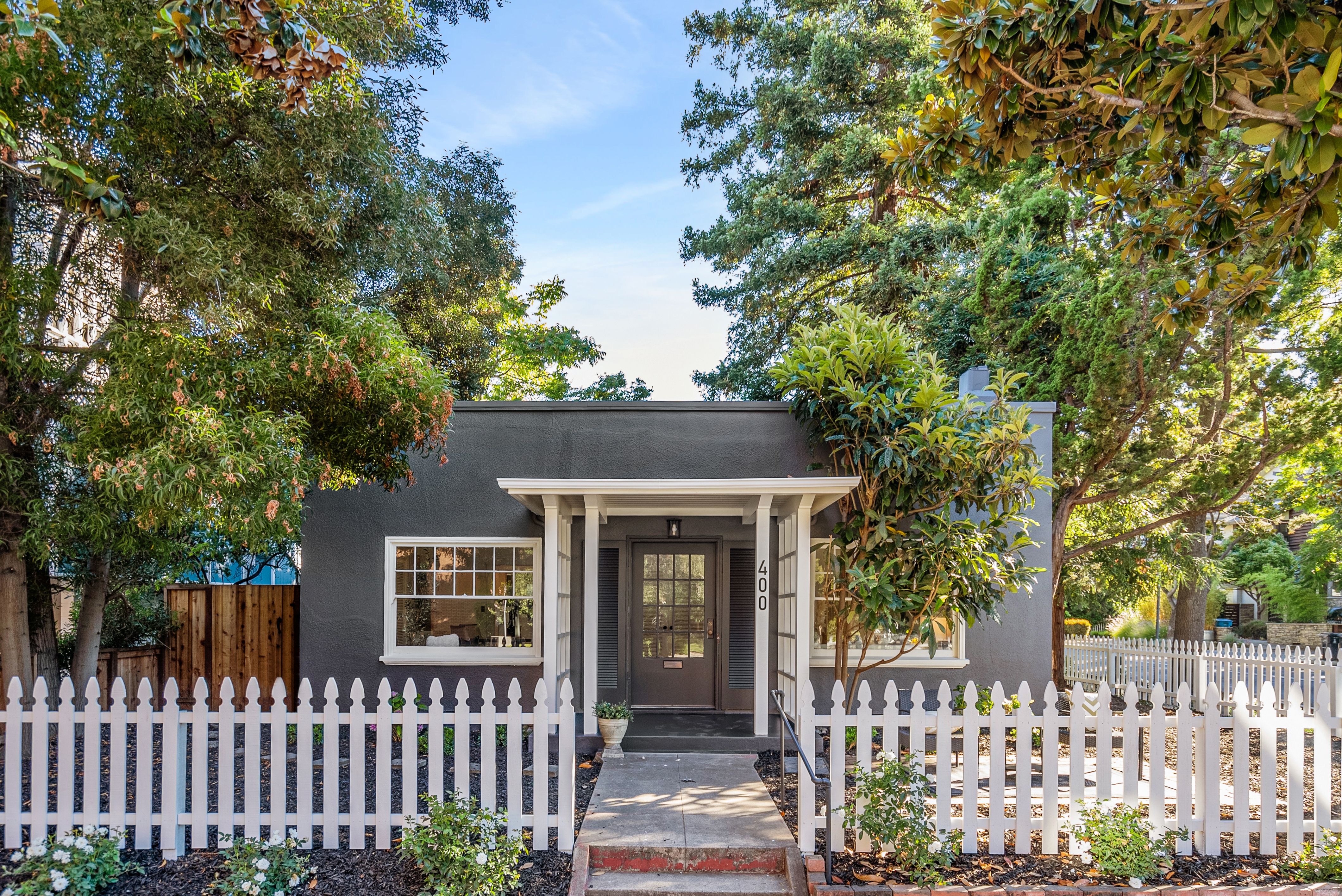 Welcoming Front Porch and a Classic White Picket Fence