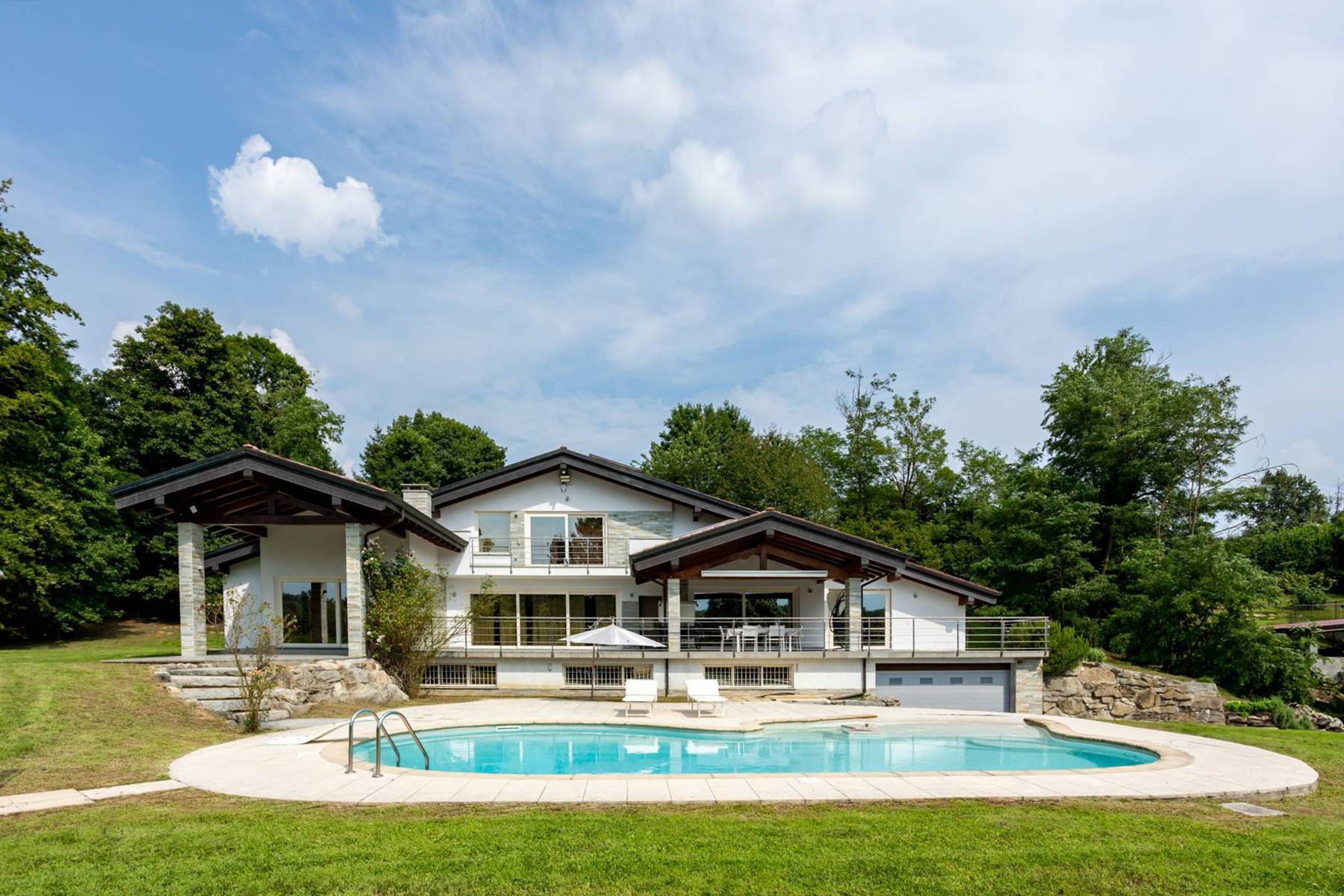 Modern villa surrounded by greenery