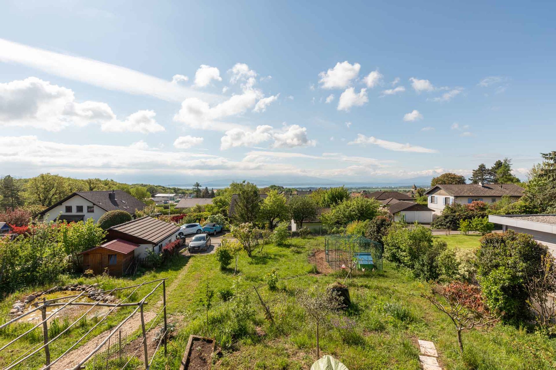 Green, family setting for this property with building potential