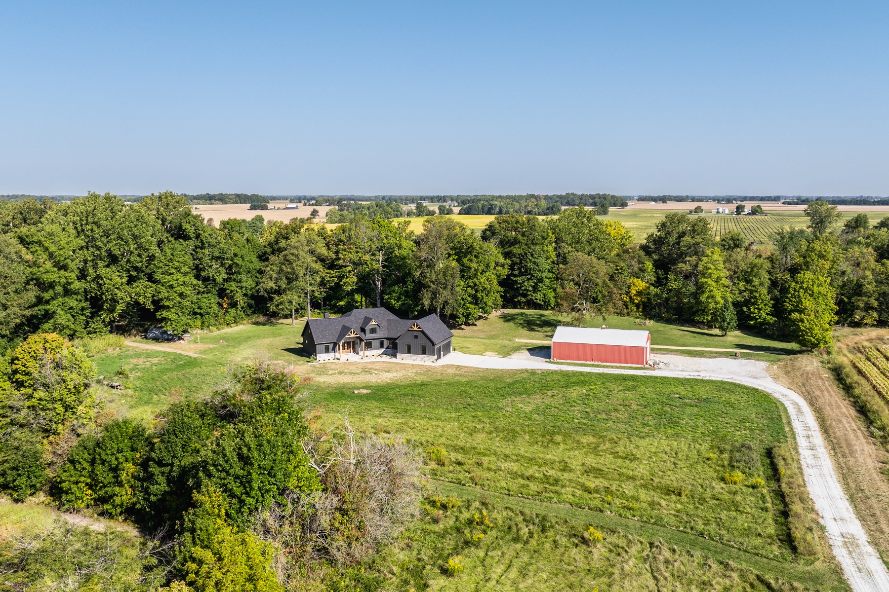 Stunning Custom-Built Ranch On 24+ Acres of Serene Countryside