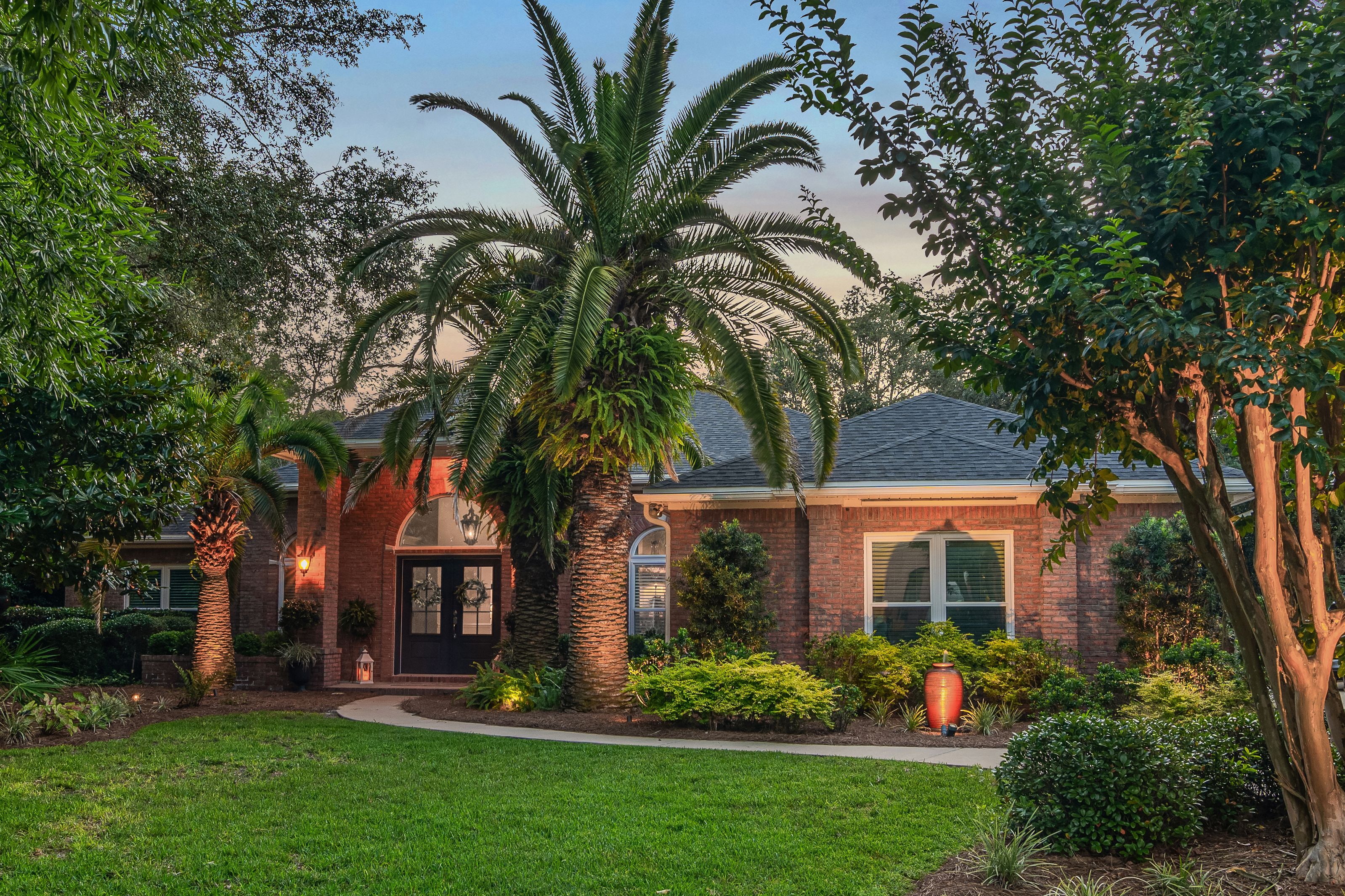 One Level Brick Home With Three Car Garage In Gated Community