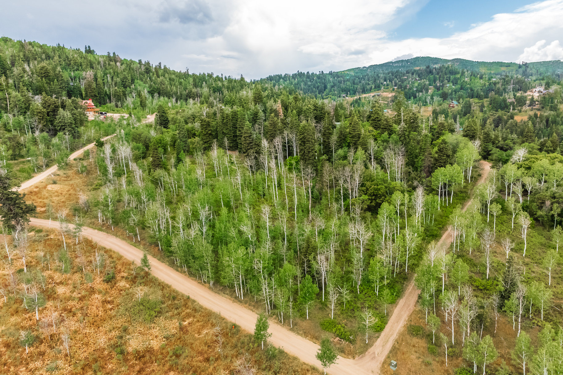 Serene 2-Acre Pine Meadow Ranch Homesite With Exceptional Surroundings