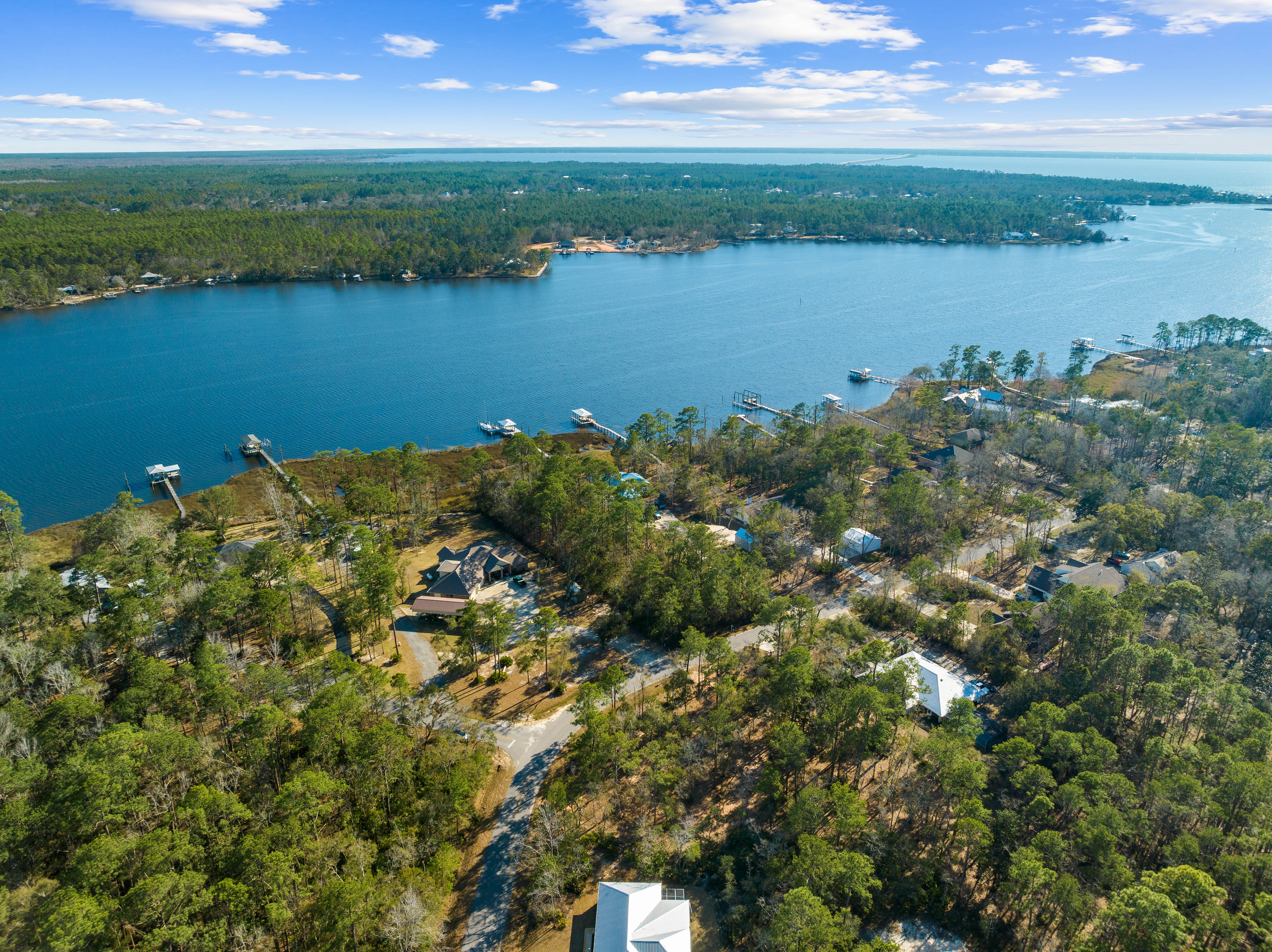 Serene Waterfront Living On More Than One Acre