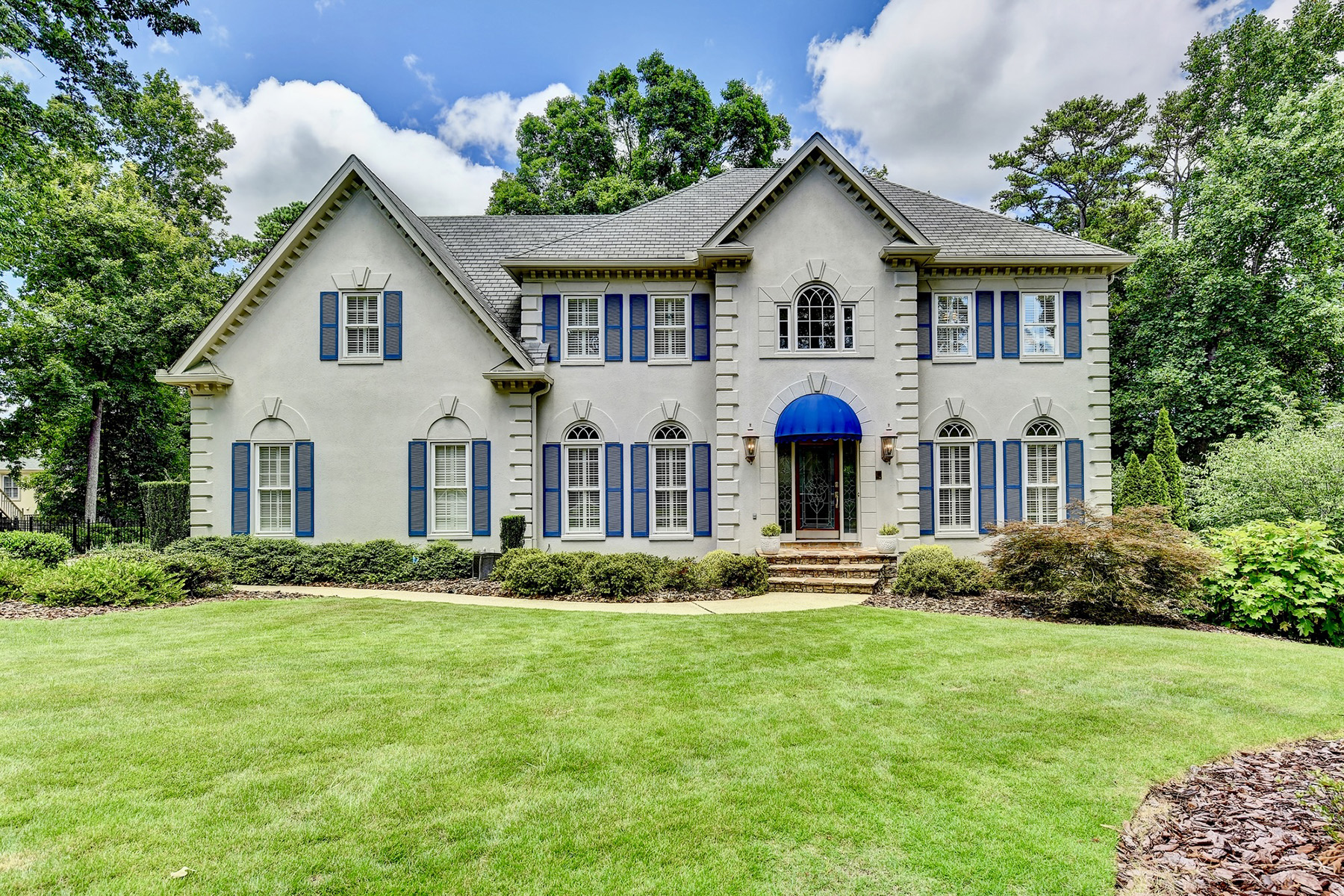 Stately Six Bedroom Home in Desirable Johns Creek Community