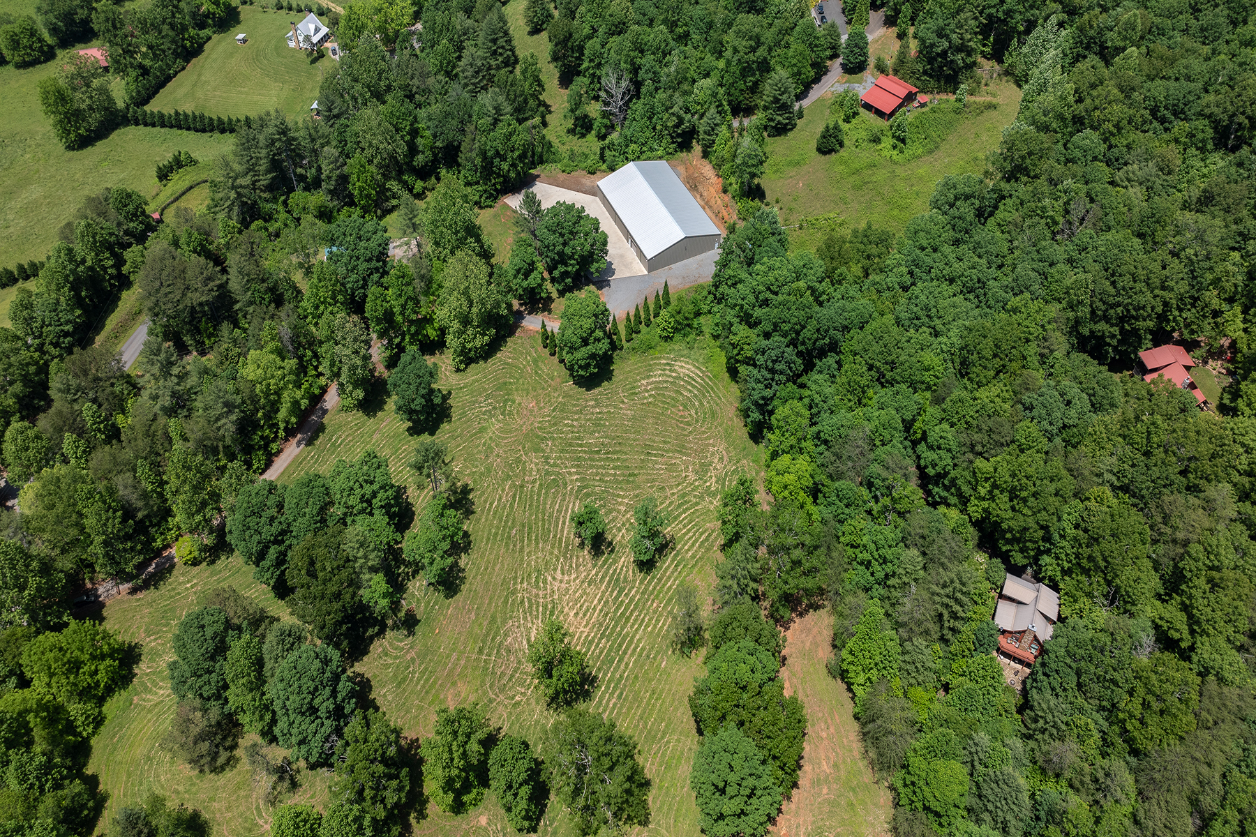 Picturesque Piece of Paradise Nestled on 12 +/- Acres