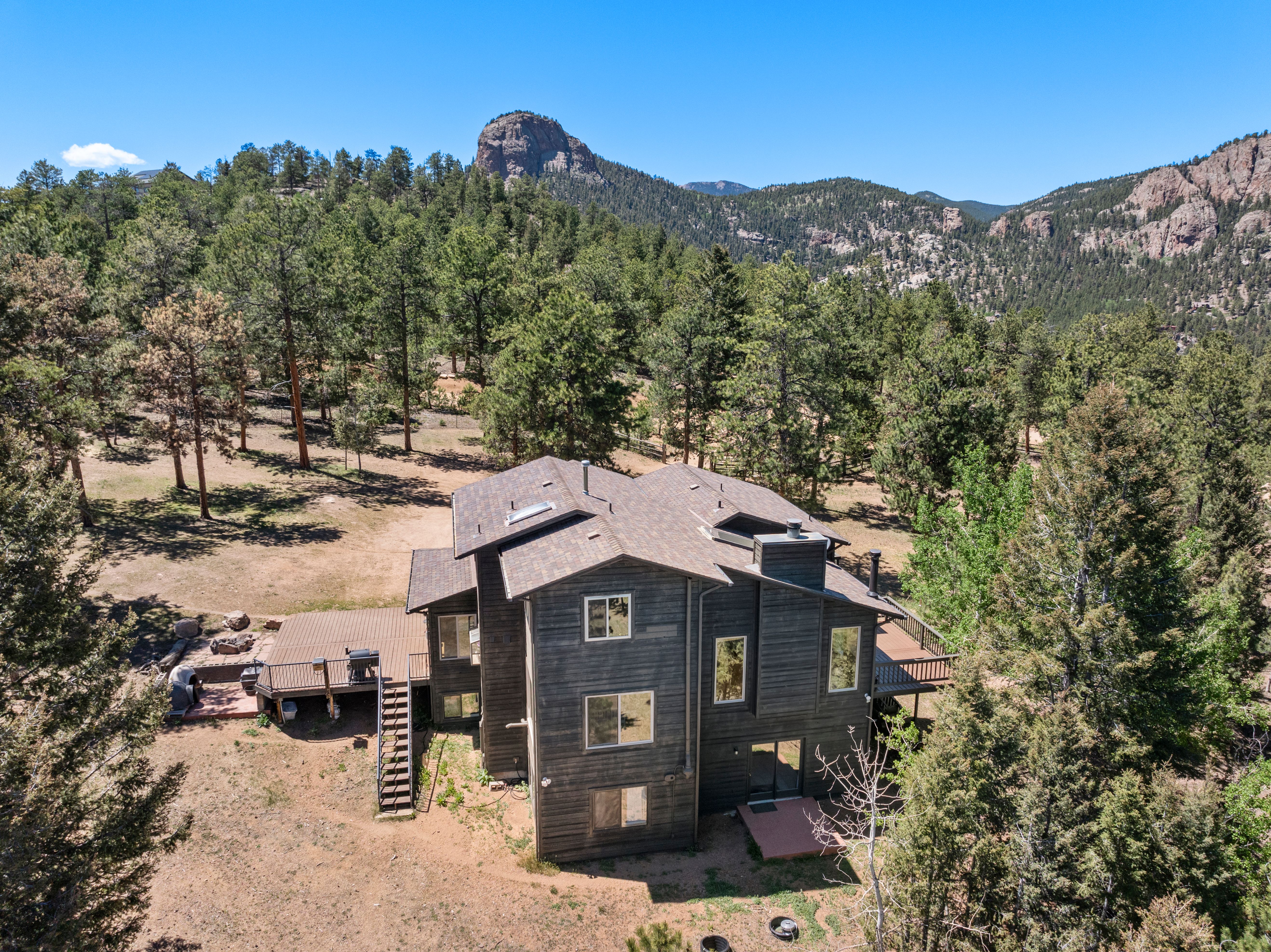 Captivating log home is nestled in the picturesque mountains of Pine, Co.