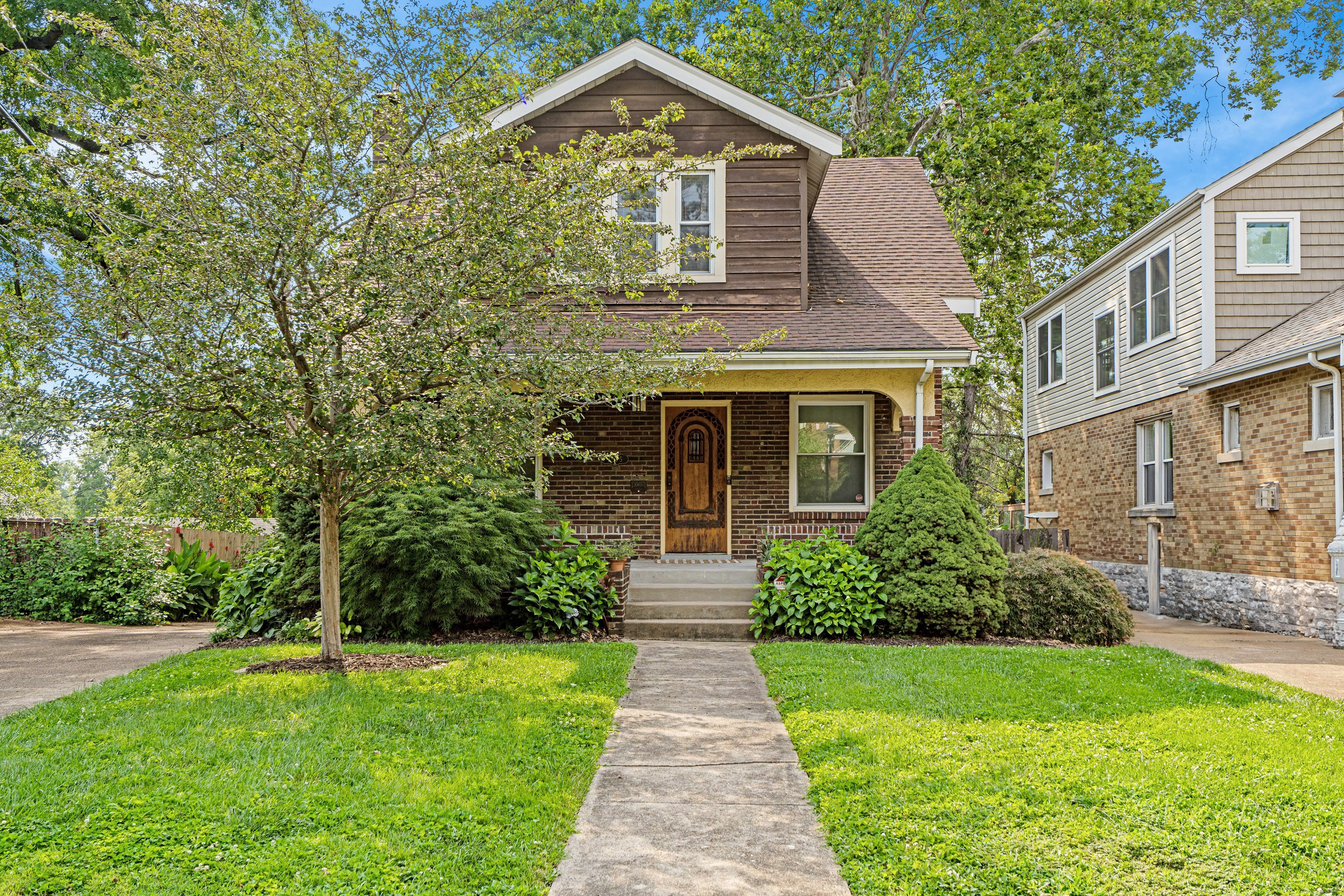 Step into the timeless charm of this classic Richmond Heights bungalow