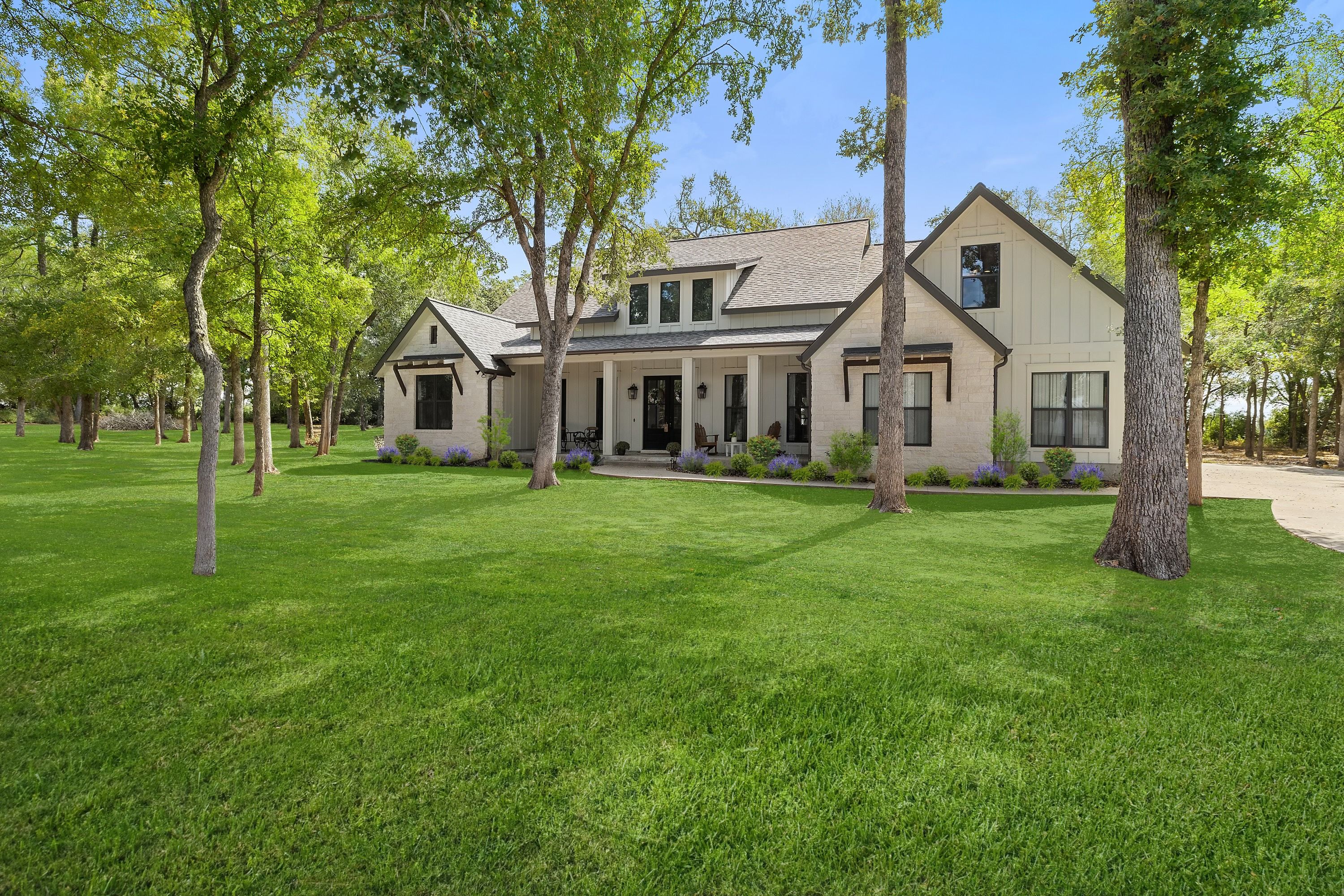 Modern Farmhouse by Nalle Custom Homes on one acre