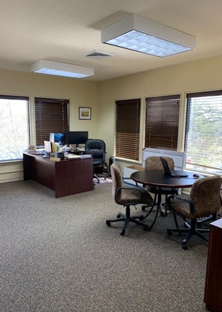 Private office with small conference table