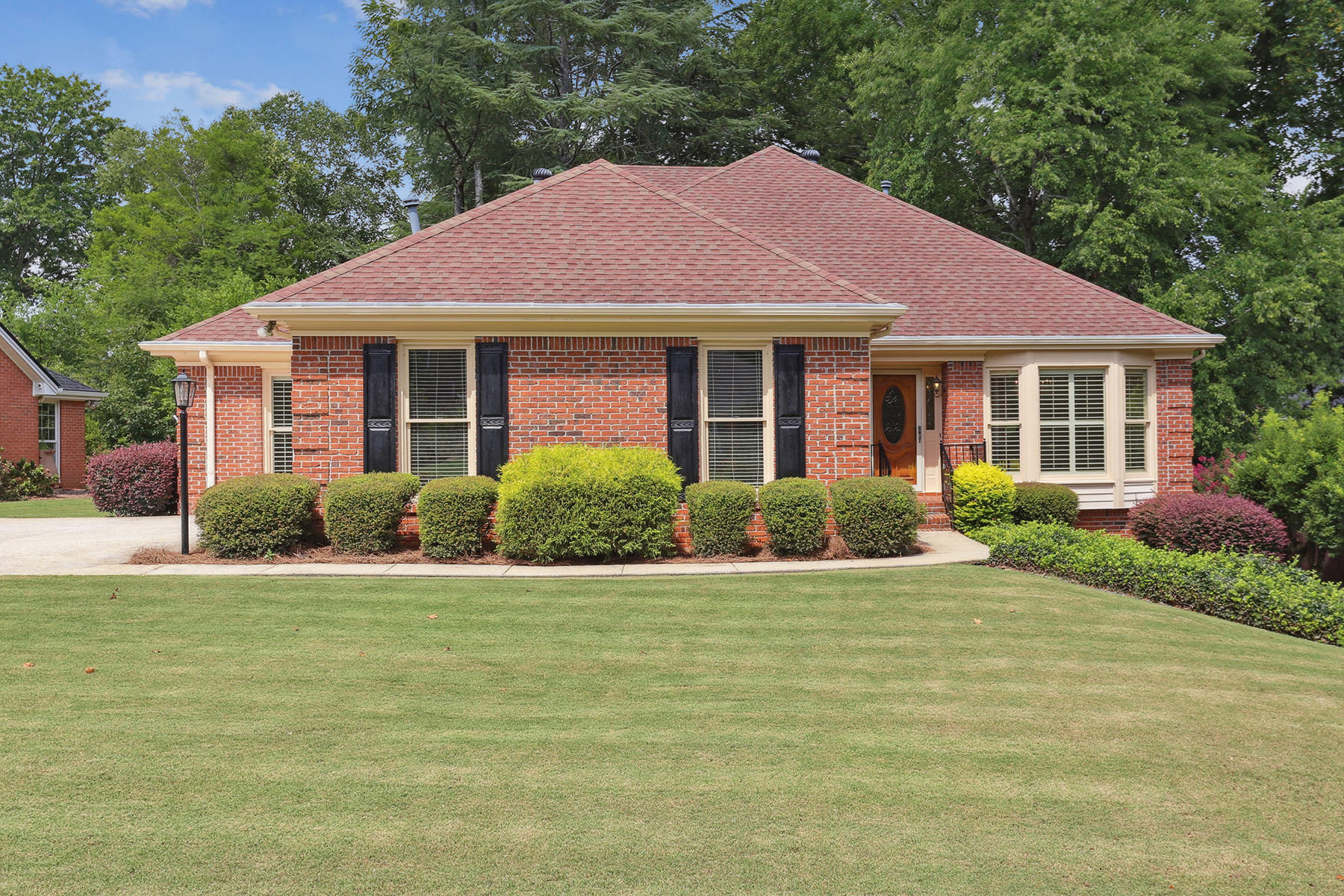 Traditional Charm and Modern Amenities in Rare All Brick Home